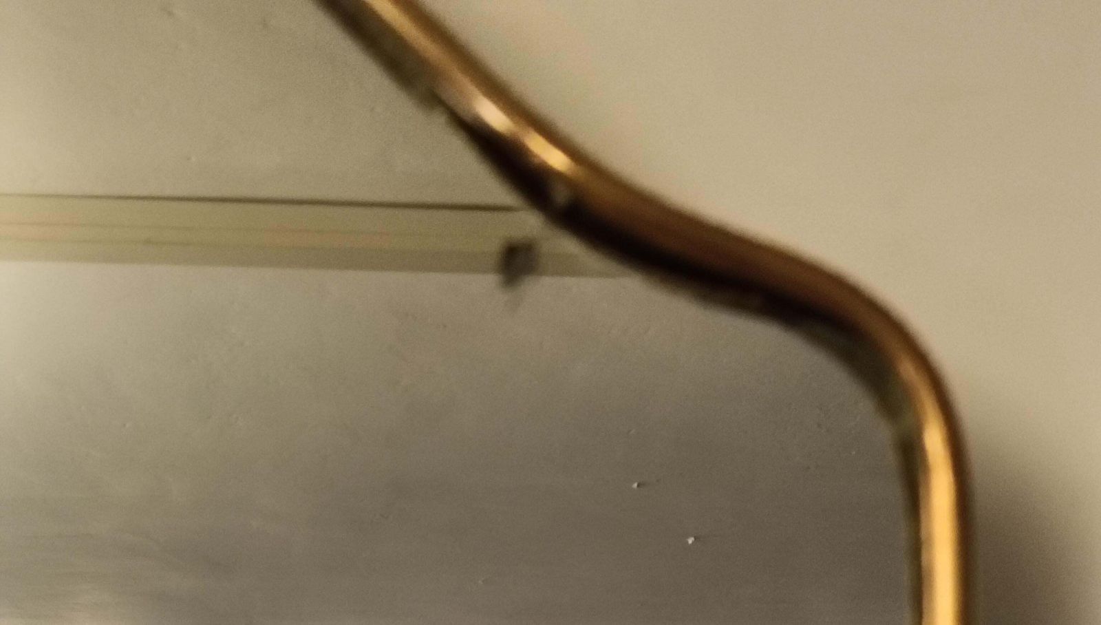 Shaped Brass Wall Mirror, Italy 1950s photo vinterior