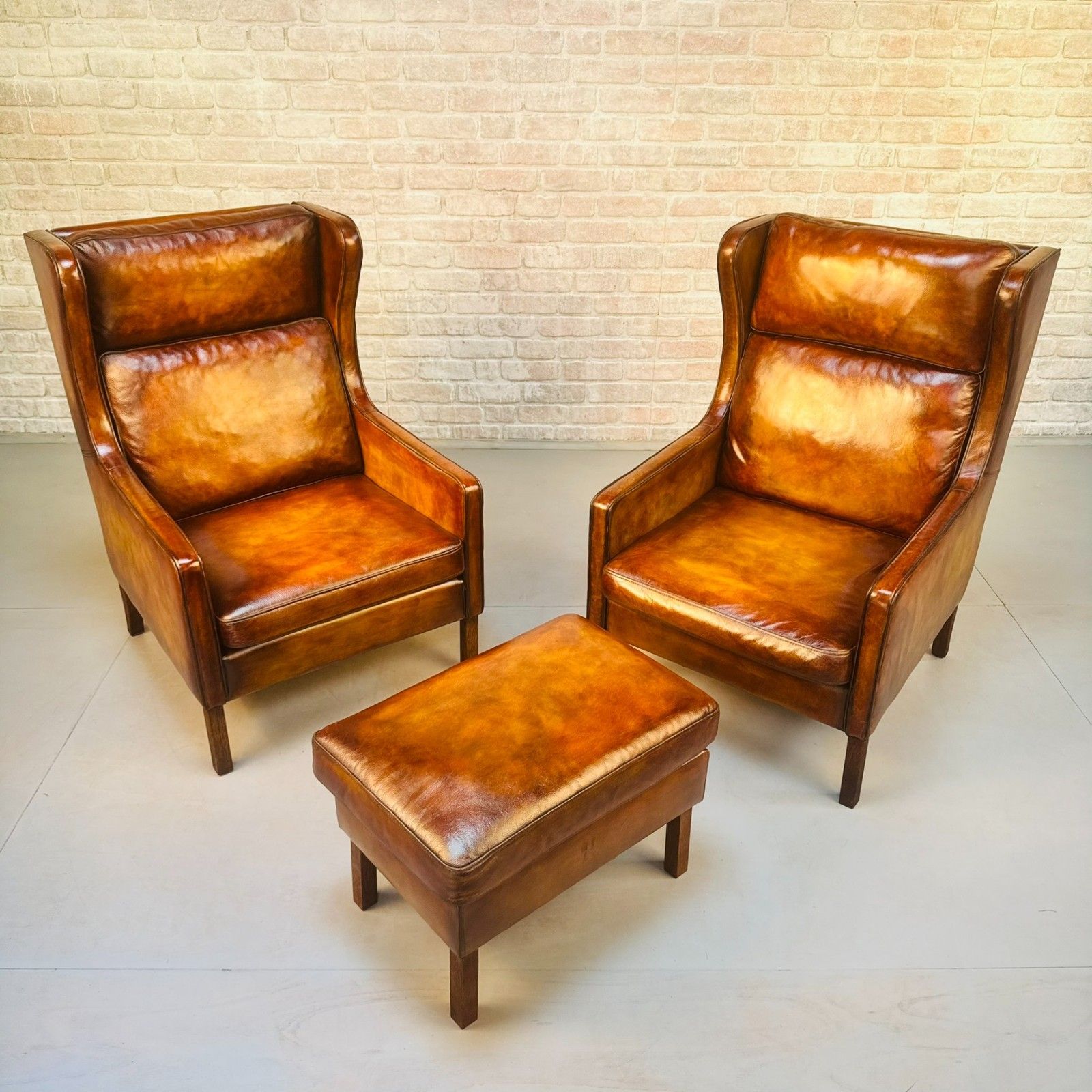 Pair Vintage Danish Wingback Chairs & Footstool Tan Leather Lounge Set photo for sale