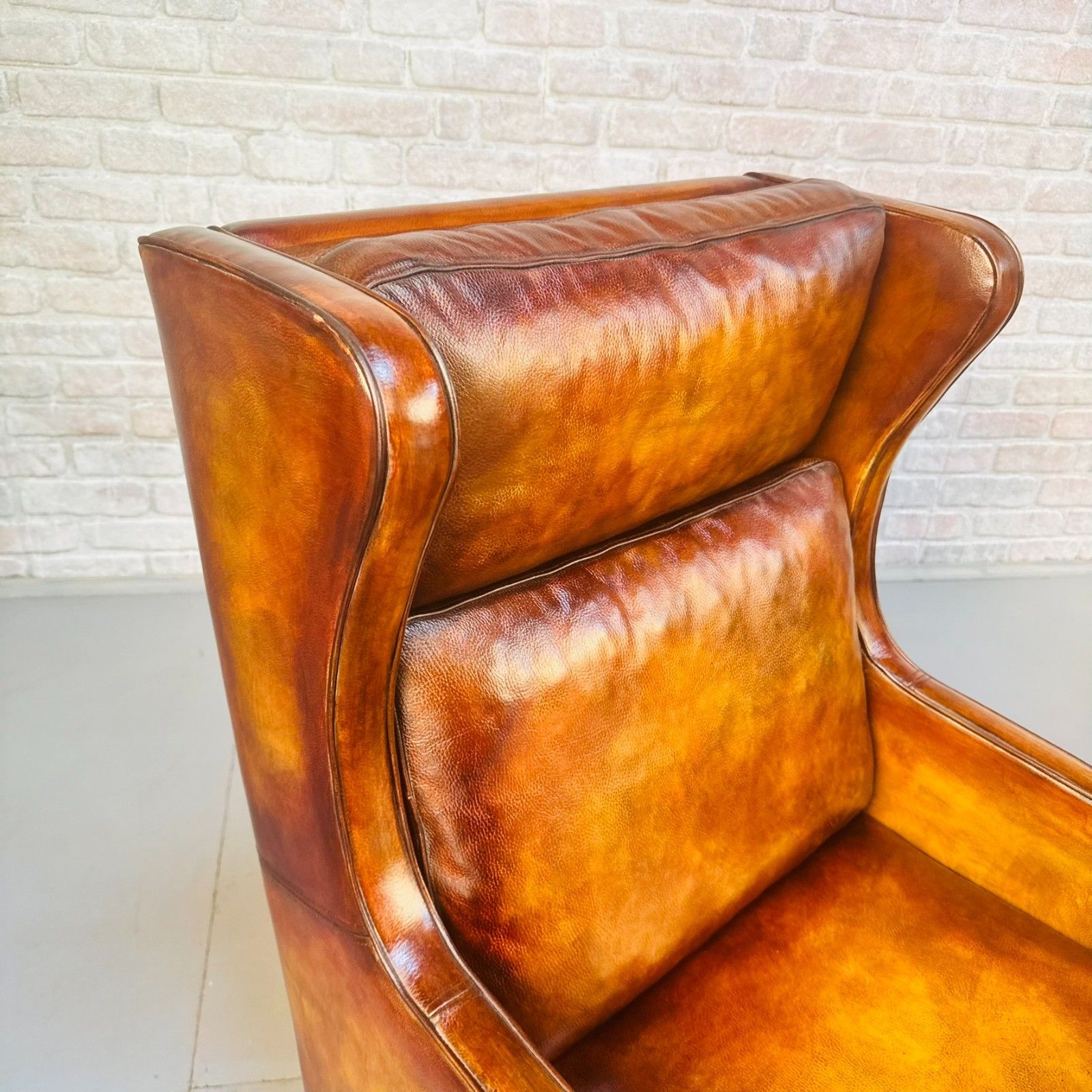 photo furniture Pair Vintage Danish Wingback Chairs & Footstool Tan Leather Lounge Set