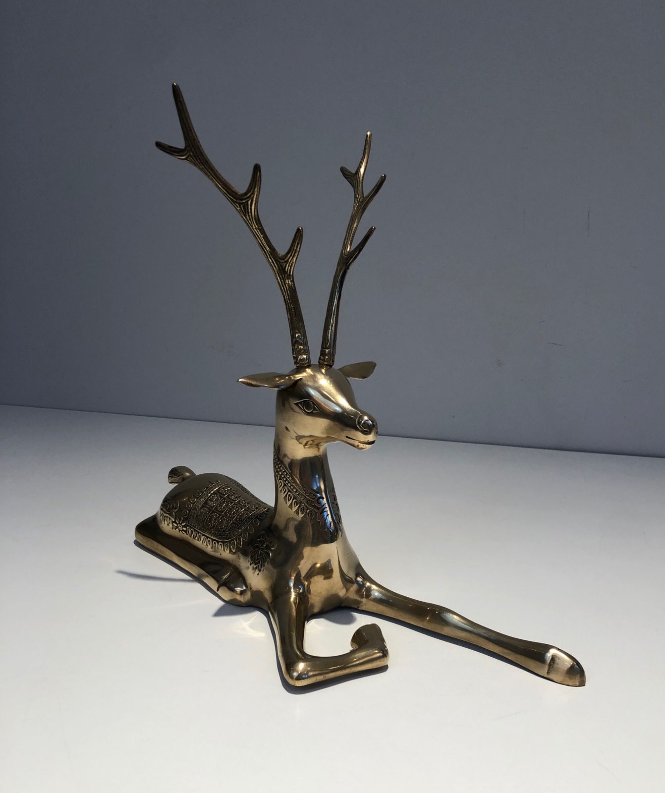 Pair Of Bronze Reclining Deer Engraved With Shamanic Motifs. French Work. Circa 1970 photo vinterior