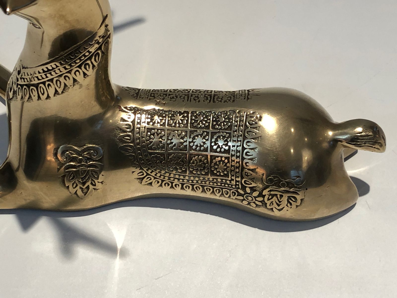 Art Pair Of Bronze Reclining Deer Engraved With Shamanic Motifs. French Work. Circa 1970 photo