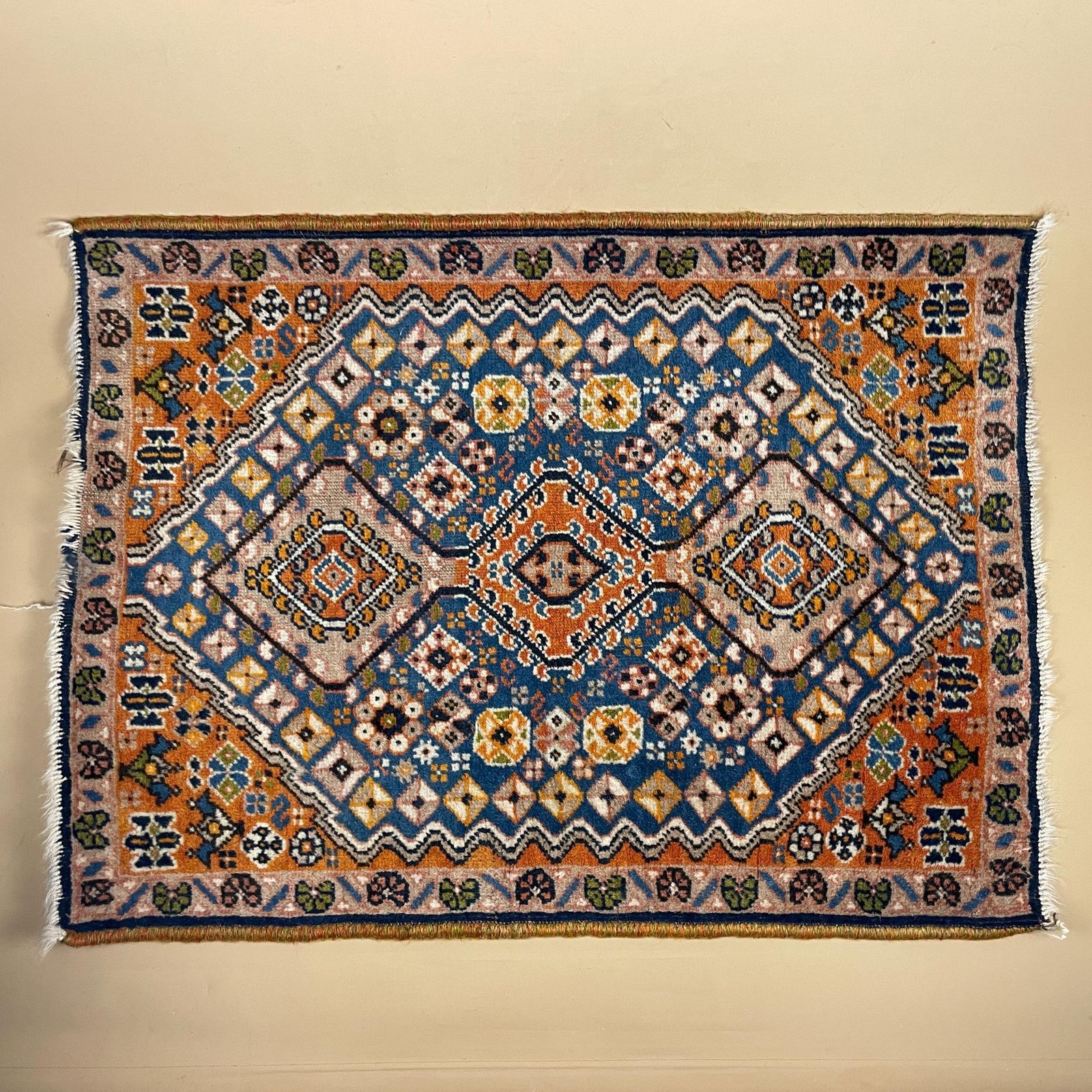 Small Accent Rug Wool Middle Eastern Style Decorative Tasselled Orange Blue Detailed Pattern photo furniture