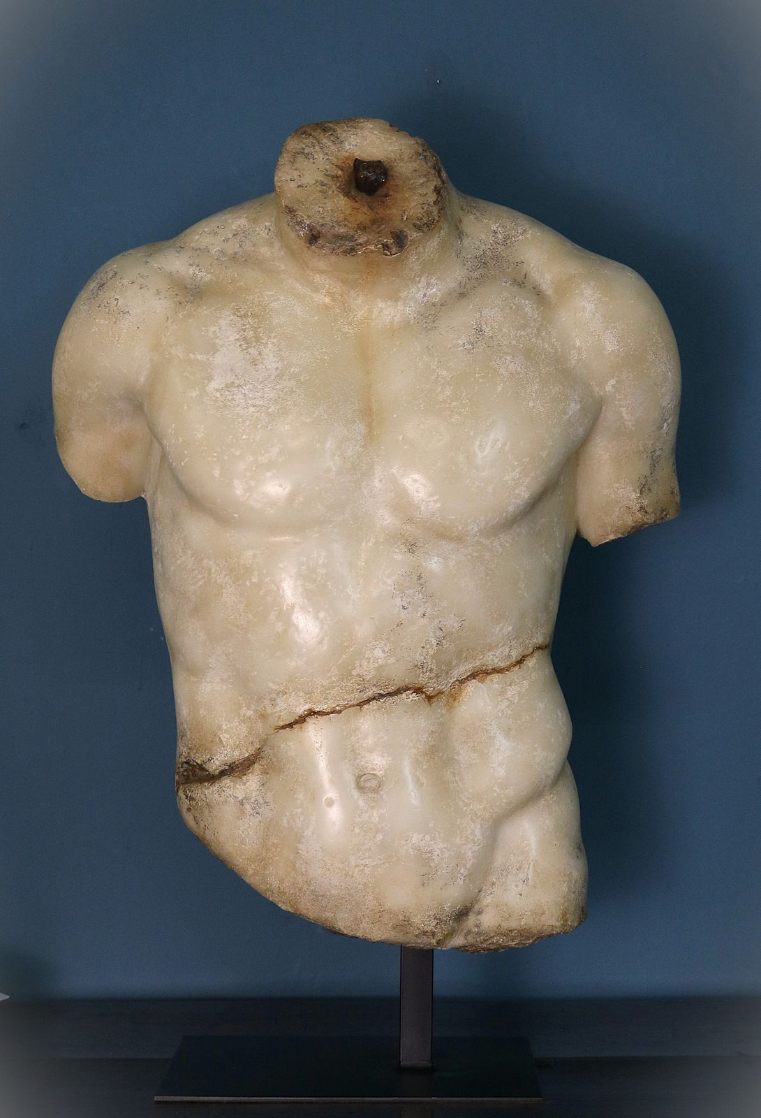 Sculpture Of A Male Torso In The Hellenistic Style