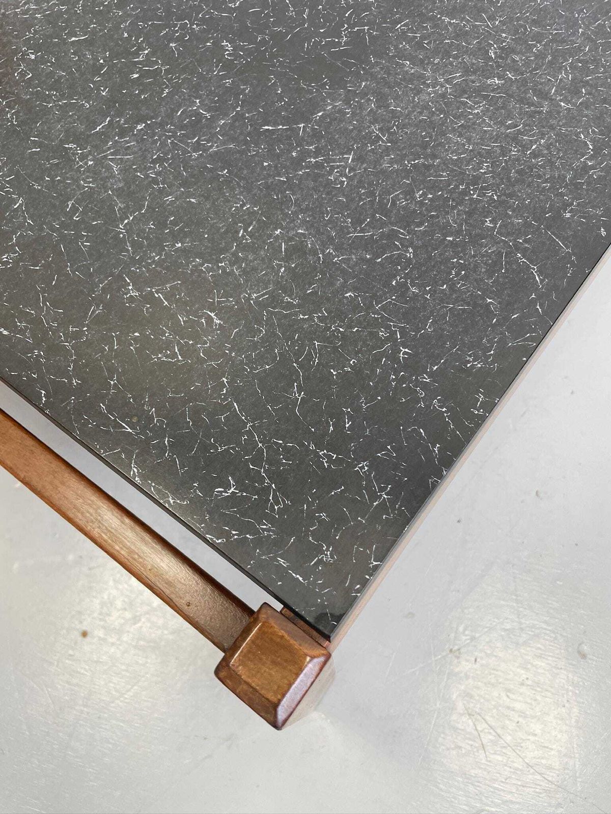 Low Coffee Table Designed By Guy Rogers Black Formica Top And Chunky Modernist Frame photo Furniture