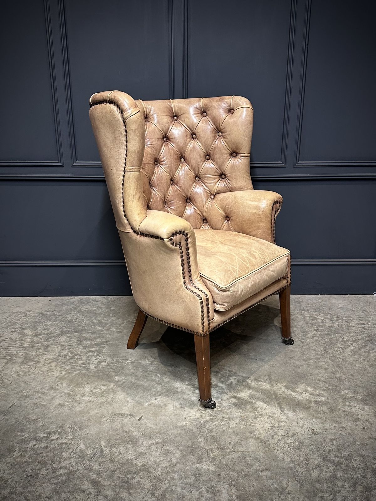 Buttoned Leather Porters Wing Chair
