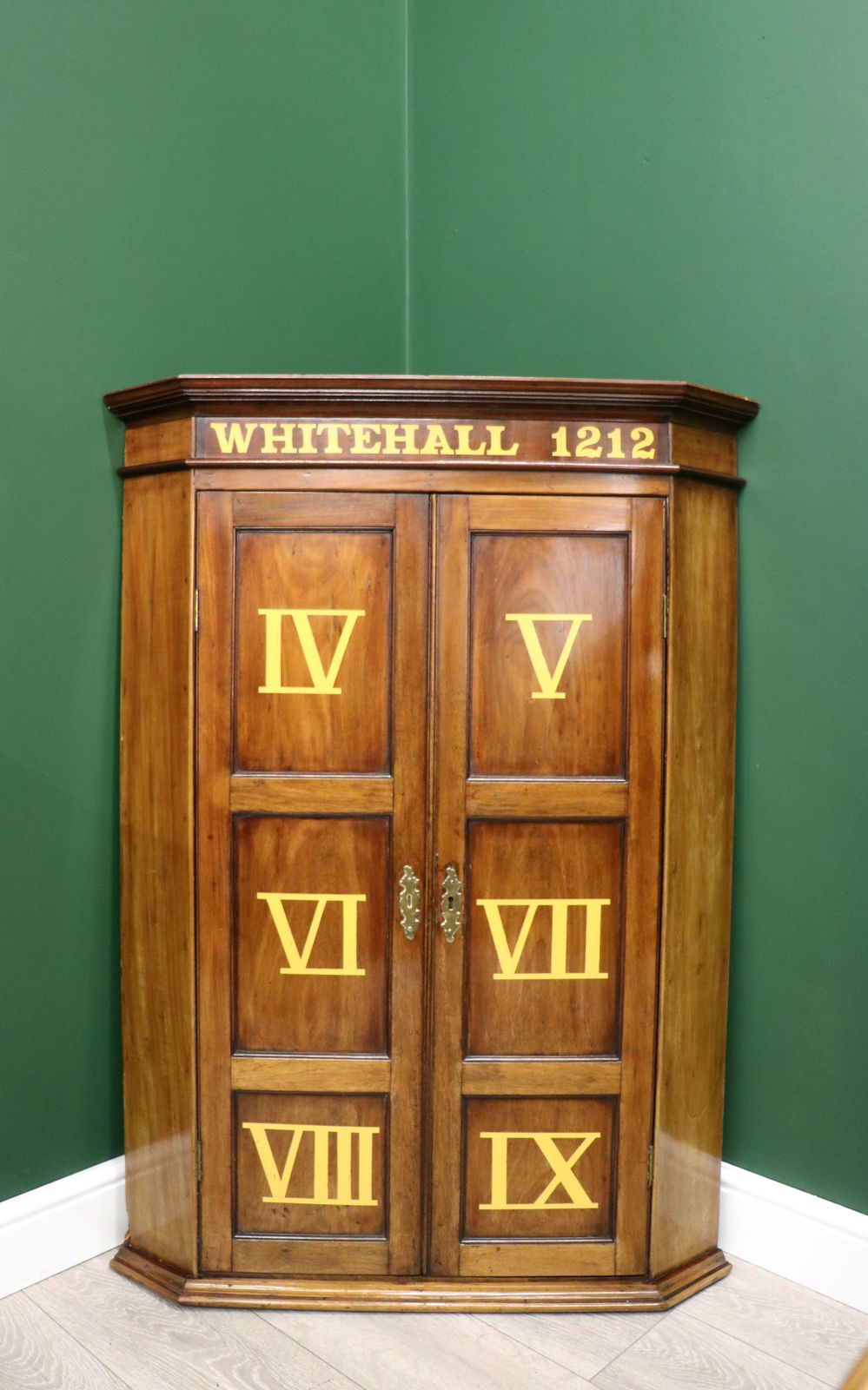 A Lovely George III Mahogany Wall Mounted Corner Cabinet.