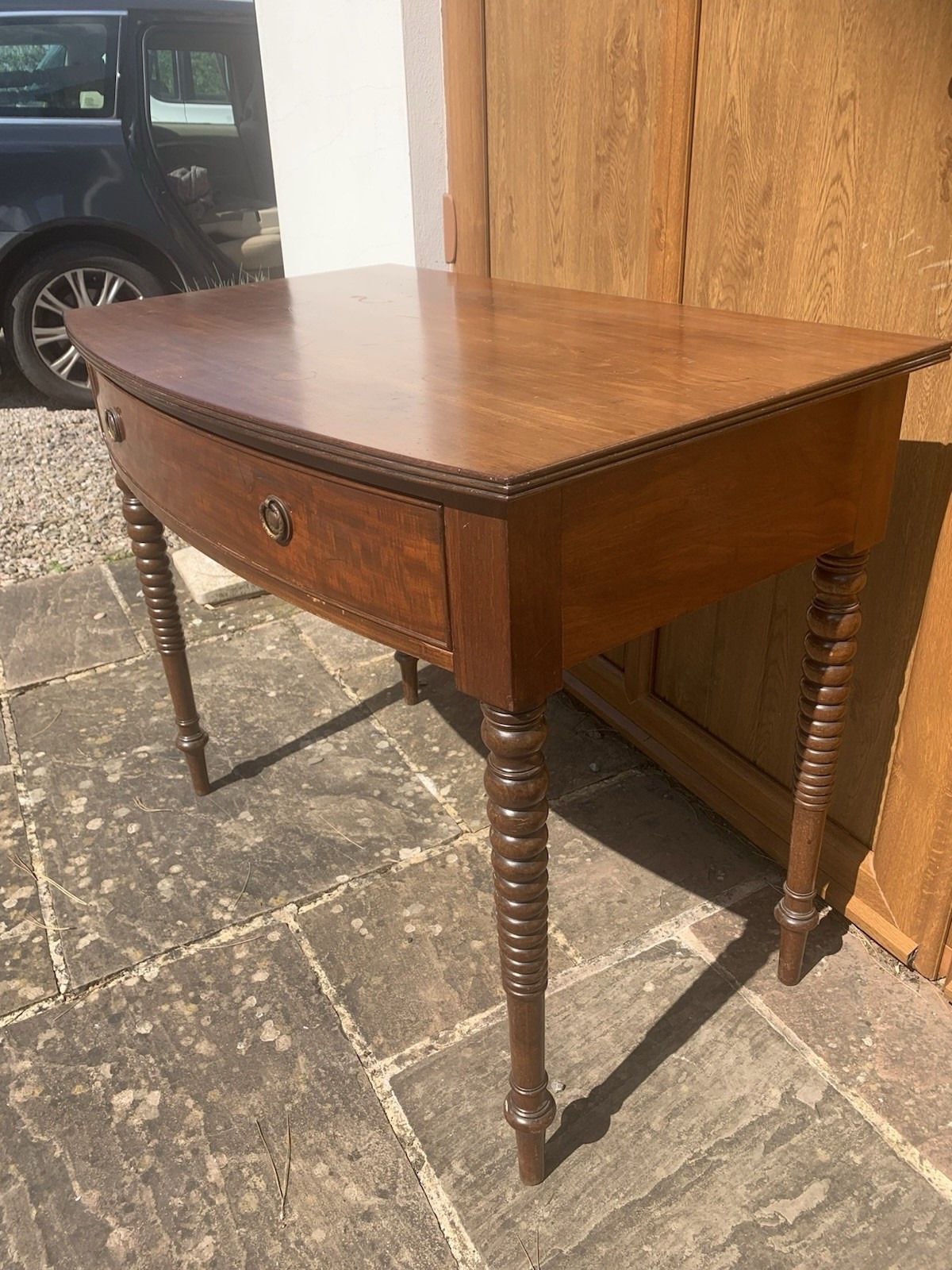 A Regency Bowfront Side Table With Bobbin Legs. photo vinterior