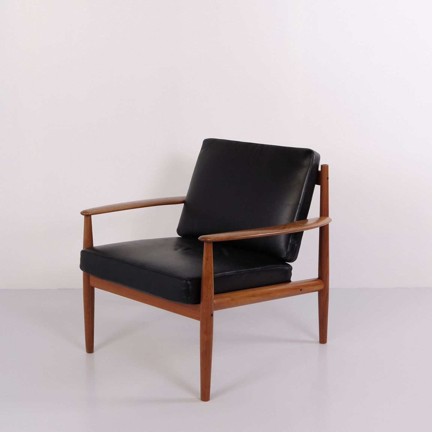 photo for sale Armchair By Grete Jalk For France & Søn In Teak And Black Leather, 1960s
