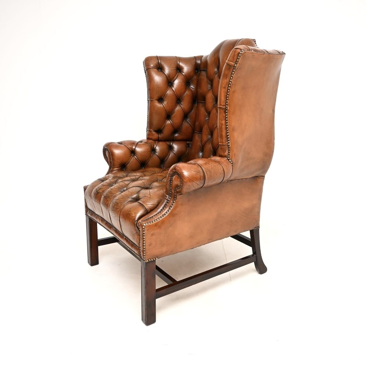 Antique Deep Buttoned Leather Wing Back Armchair photo for sale
