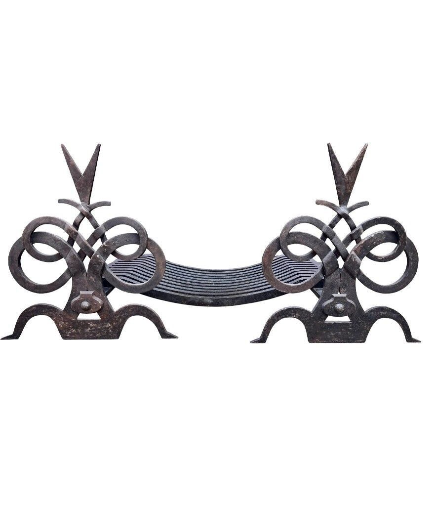 A Pair Of French Hand Forged Wrought Iron Fire Dogs In The Style Of Gilbert Poillerat