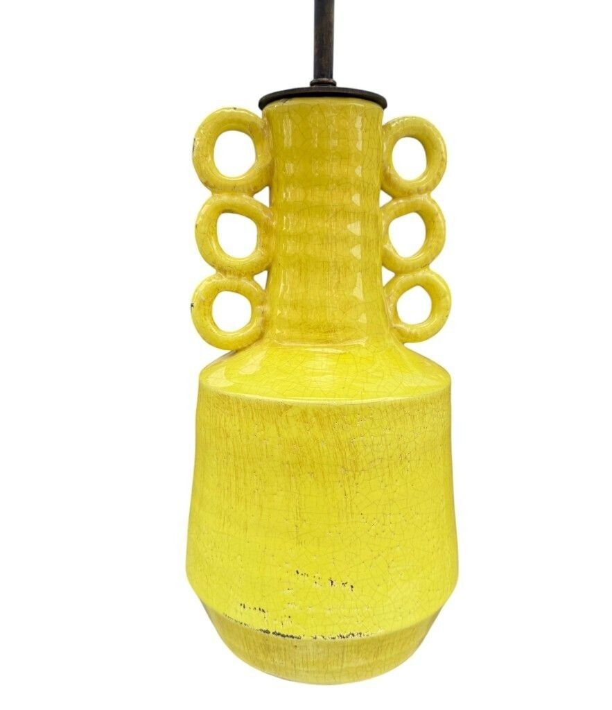 A Mid Century Style Yellow Ceramic And Bronze Lamp With Six Handle Design. photo furniture