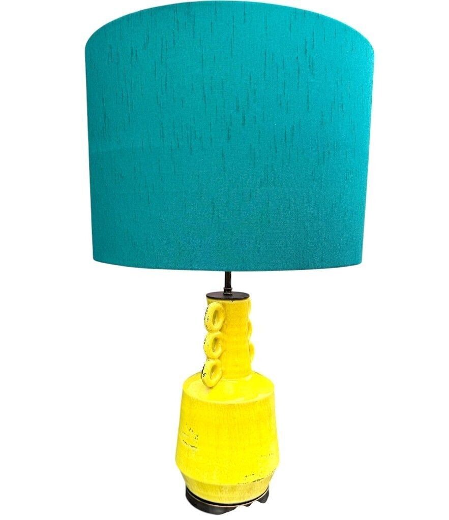 A Mid Century Style Yellow Ceramic And Bronze Lamp With Six Handle Design. photo for sale