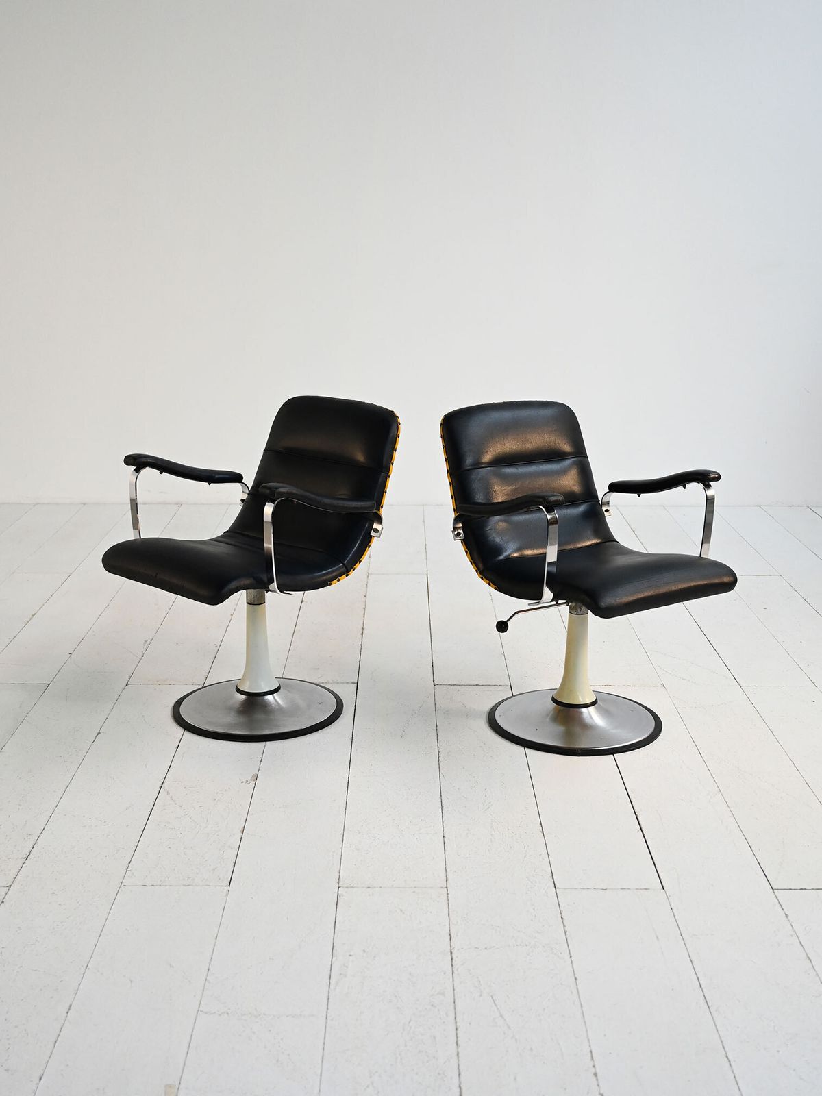 Pair Of European 1970s Swivel Armchairs In Faux Leather And Steel photo for sale