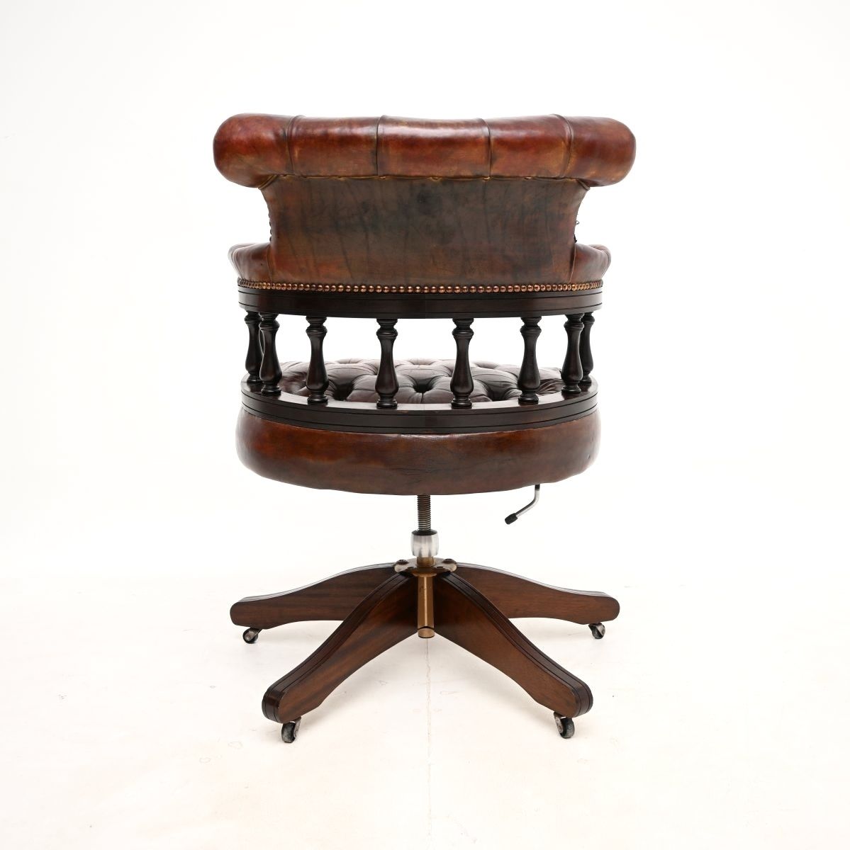 1008.0 Antique Leather And Mahogany Swivel Captains Desk Chair photo