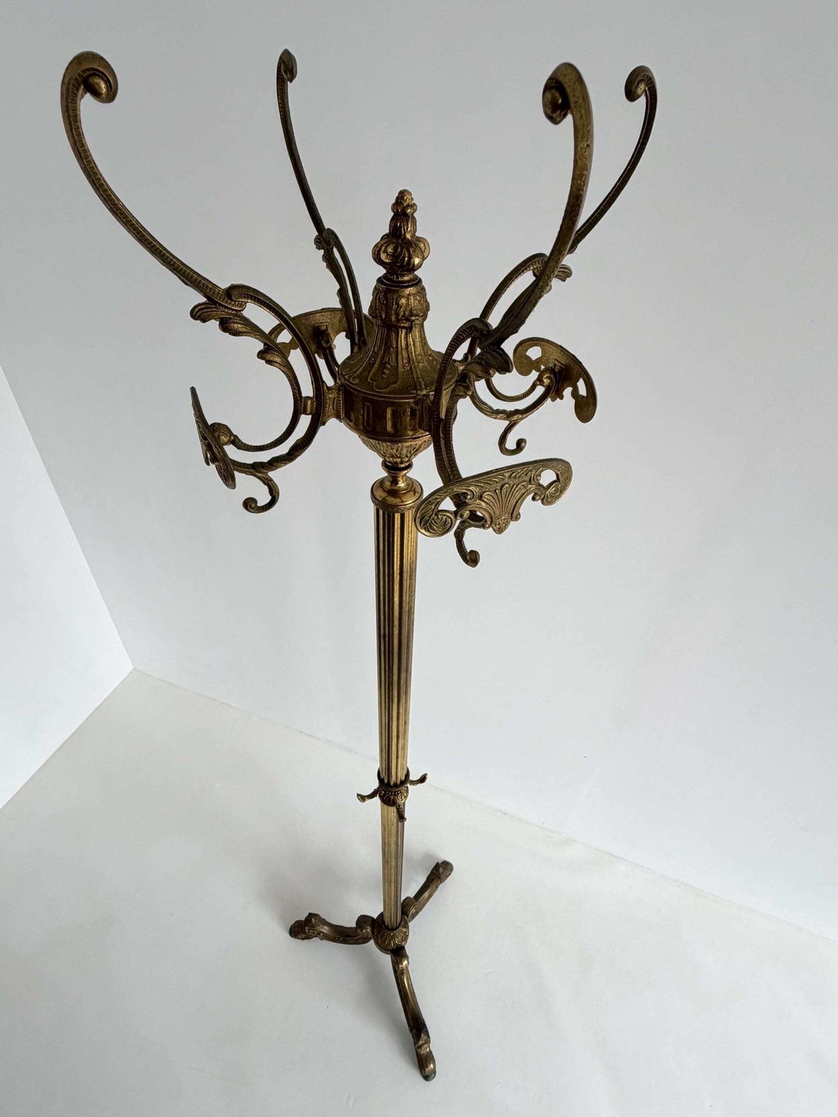 Vintage Brass Coat Rack With Rotating Crown And Decorative Three Leg Base photo vintage