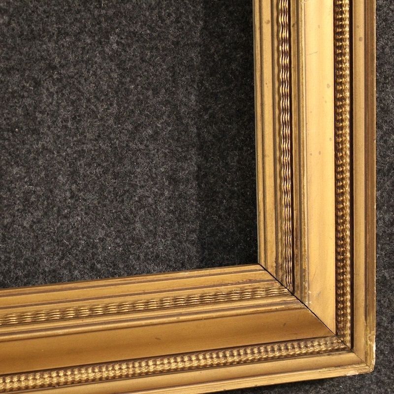 20e-eeuwse Italiaanse vergulde houten lijst met gips photo buy