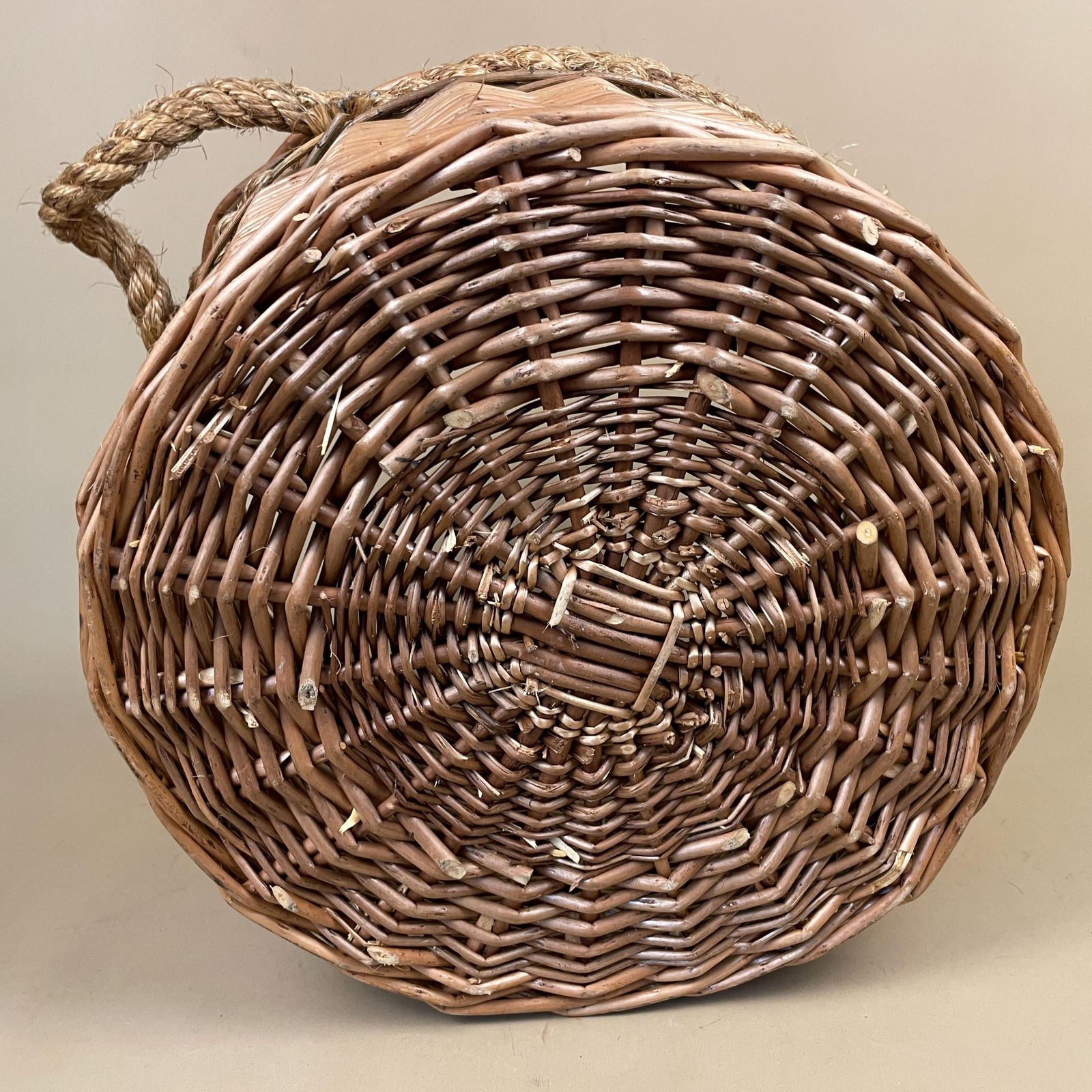 Vintage Round Basket Woven Wicker Brown Antique Cylinder Storage Farmhouse Cottage Decor Laundry Cane Wood Logs Fireplace Rope Handles photo vintage