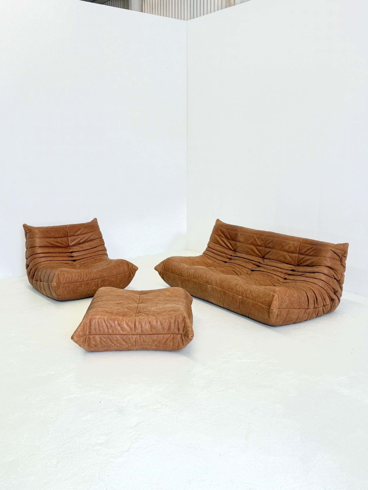 photo furniture Ligne Roset Togo 3 Seater In Cognac Leather