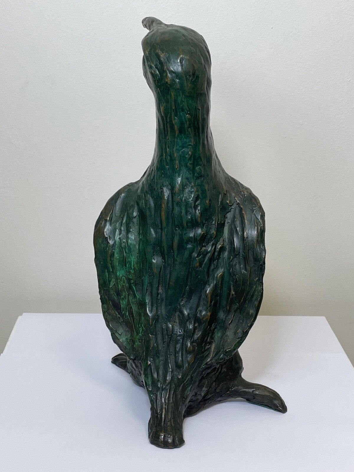 Gepatineerd bronzen beeldje van een pinguïn photo for sale
