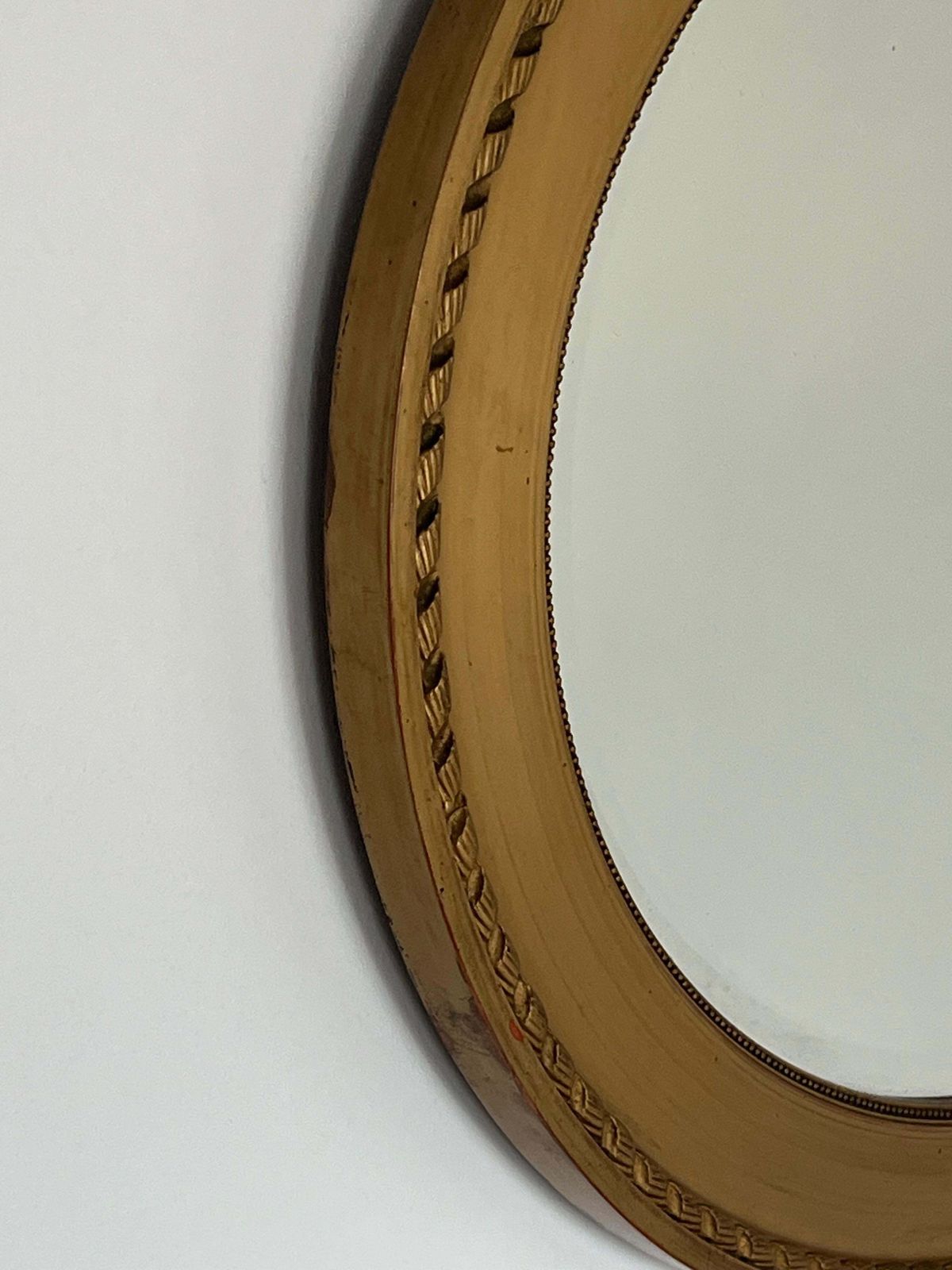 Ovale wandspiegel, vergulde lijst met touw- en kralendetail, facetglas, ca. 1890 photo vinterior