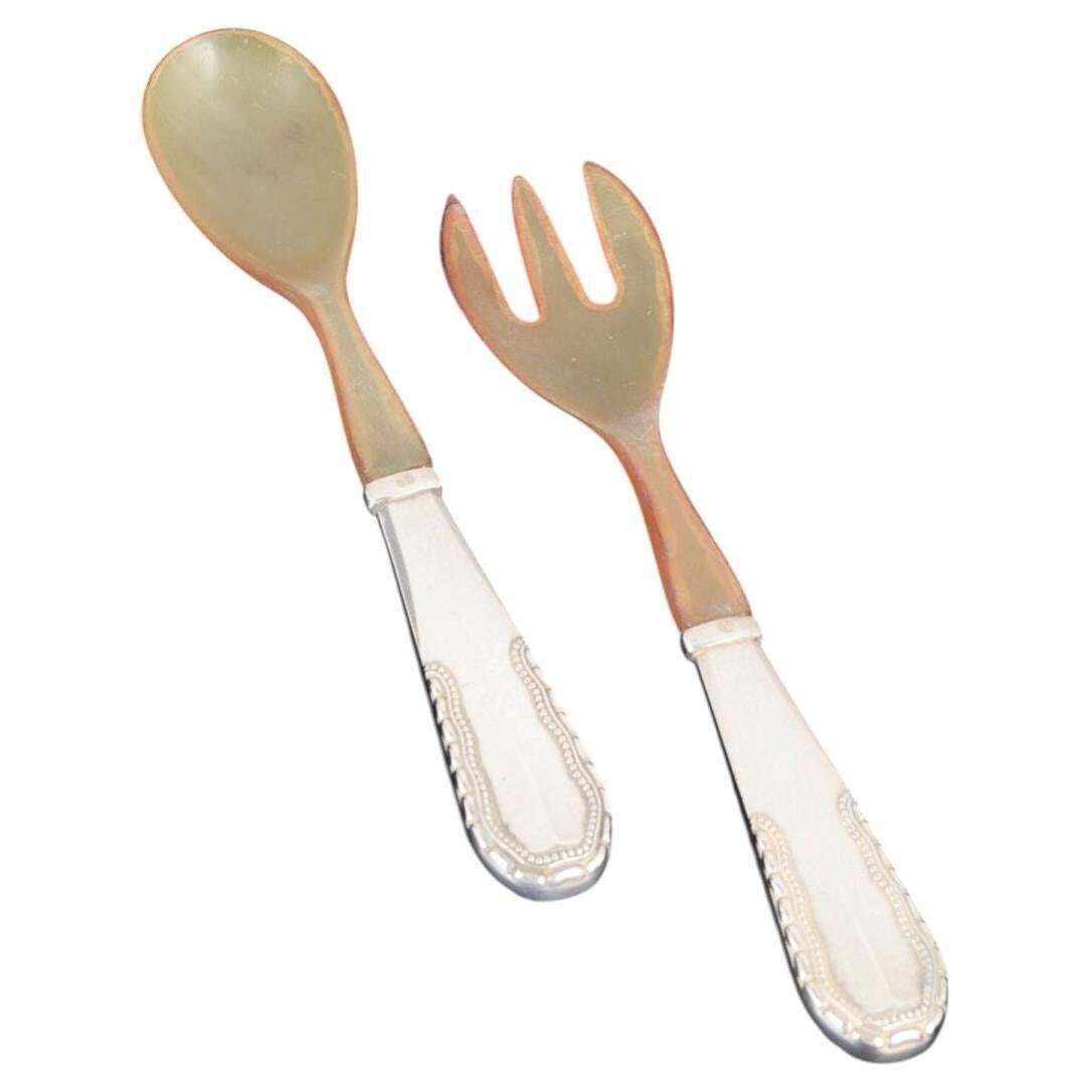 Couverts à salade Georg Jensen en argent et os, anses motif Viking.