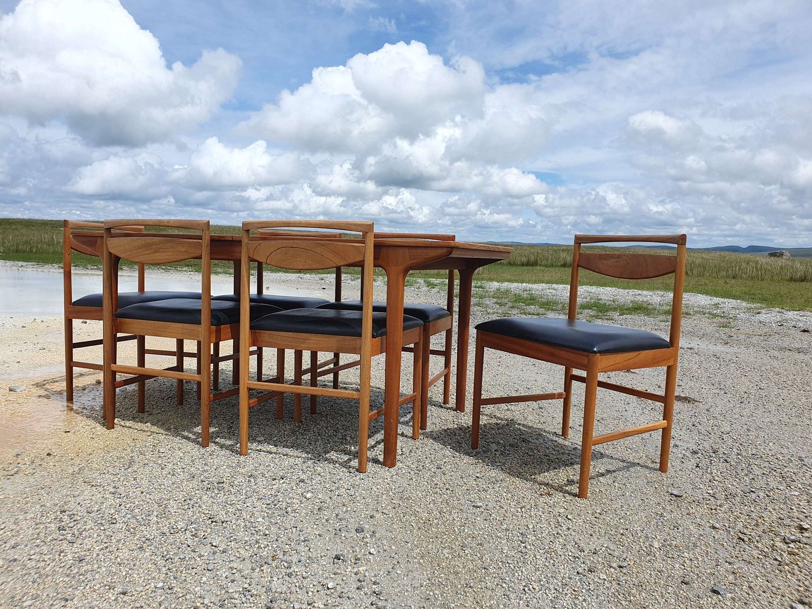 Furniture A Mid 20thc Teak, Extending Dining Table And Six Chairs By McIntosh Of Kirkcaldy. photo