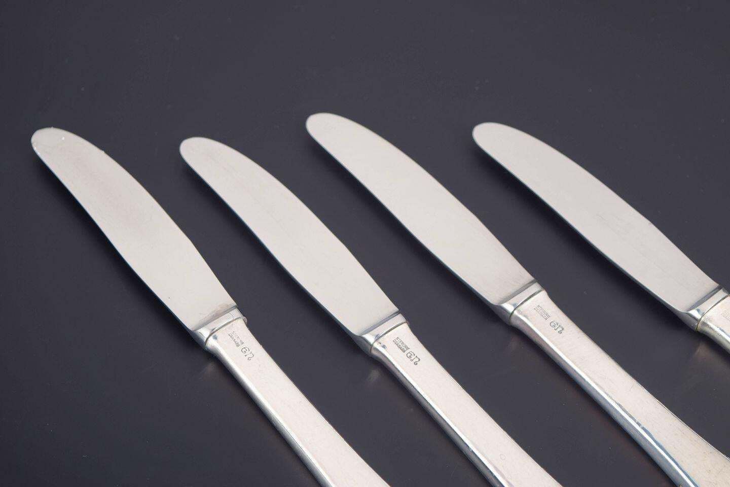 Evald Nielsen. Set van vier lunchmessen in sterling zilver en roestvrij staal. photo furniture