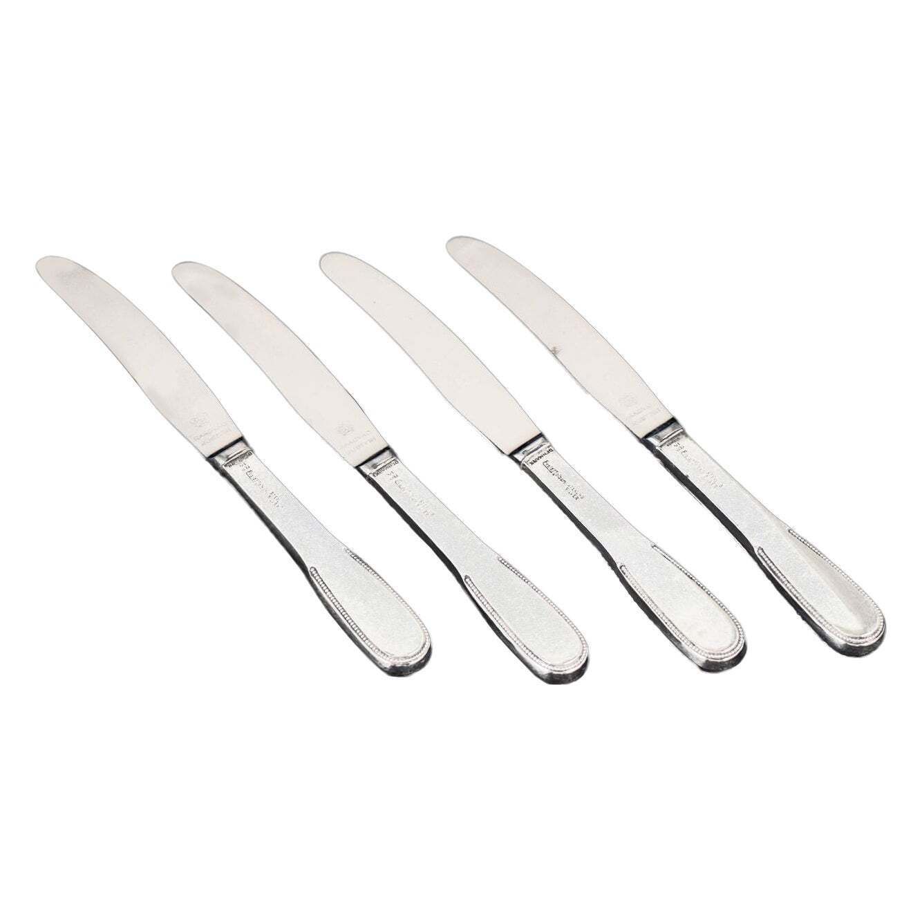 Evald Nielsen. Set van vier lunchmessen in sterling zilver en roestvrij staal