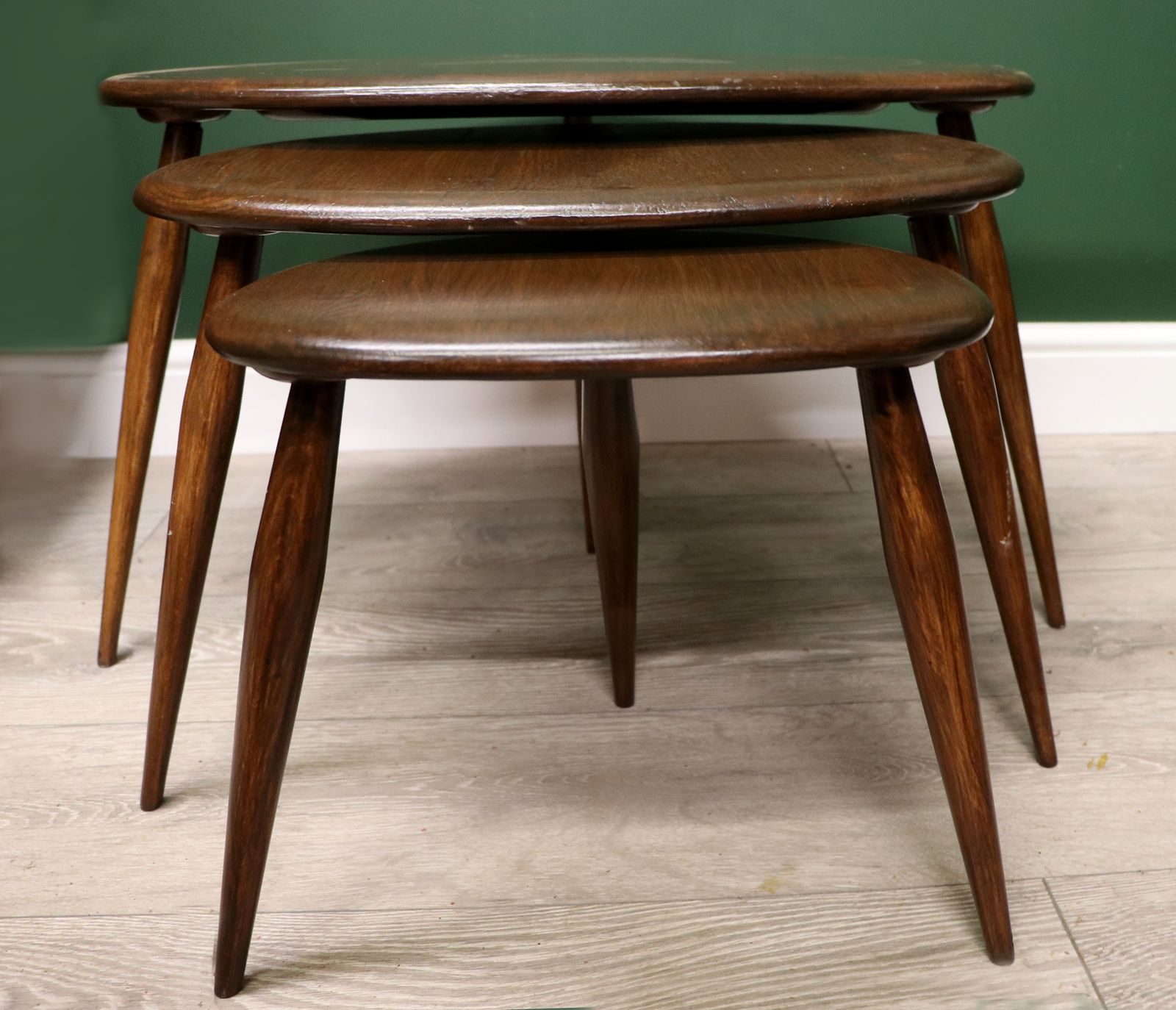 A Wonderful Iconic Nest Of Three Rare Ercol ‘Pebble’ Tables.