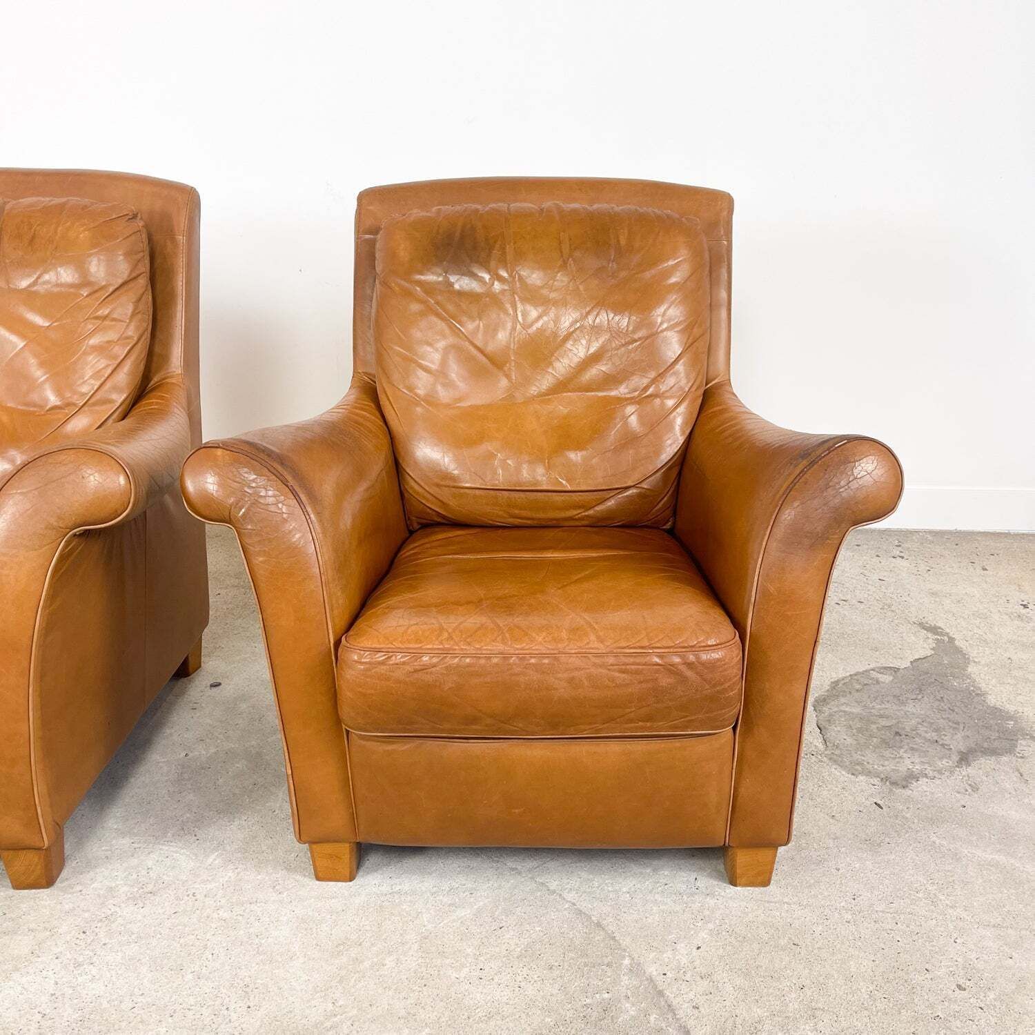 photo furniture Set Of 2 Vintage Cognac Leather Armchairs