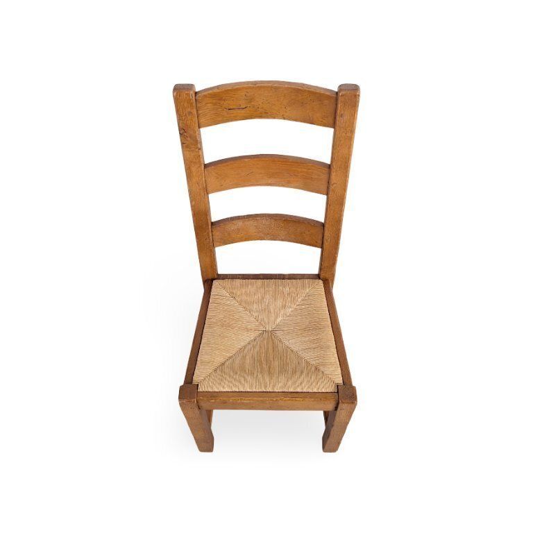Ensemble de 4 chaises en chêne de style campagne française, années 1950, assise en jonc tressé photo for sale