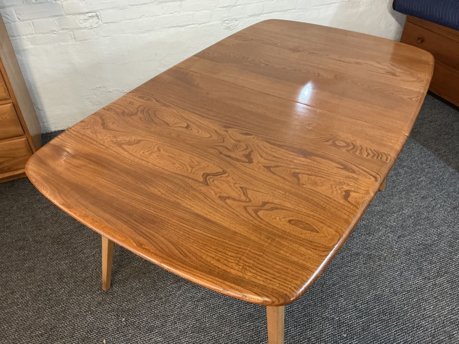 Furniture Ercol Grand Windsor Extending Plank Dining Table. photo