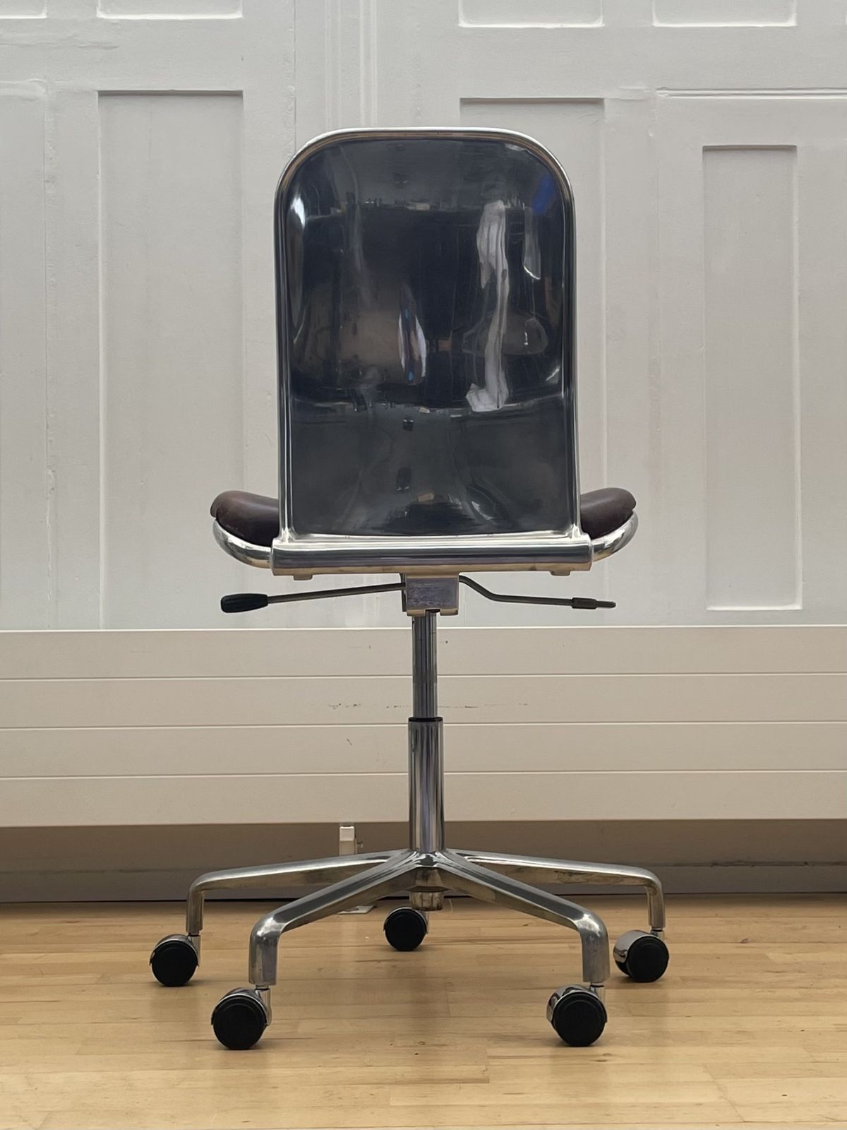 Vintage Hille Fred Scott Supporto Task Chair. Low Back Without Arms In Polished Aluminium With Brown Leather Seat Pads photo furniture