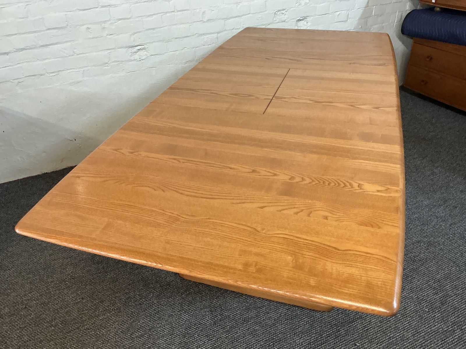 Ercol Windsor Extending Dining Table In Light Finish. photo furniture