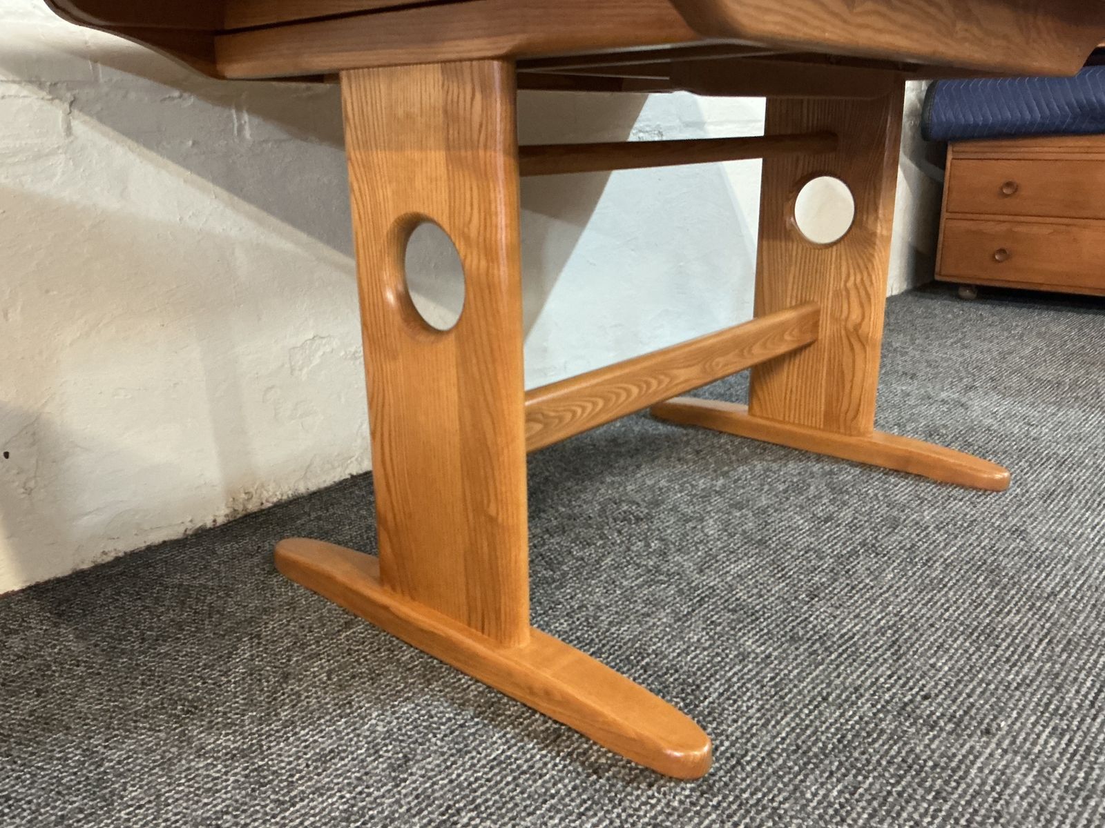 photo buy Ercol Windsor Extending Dining Table In Light Finish.