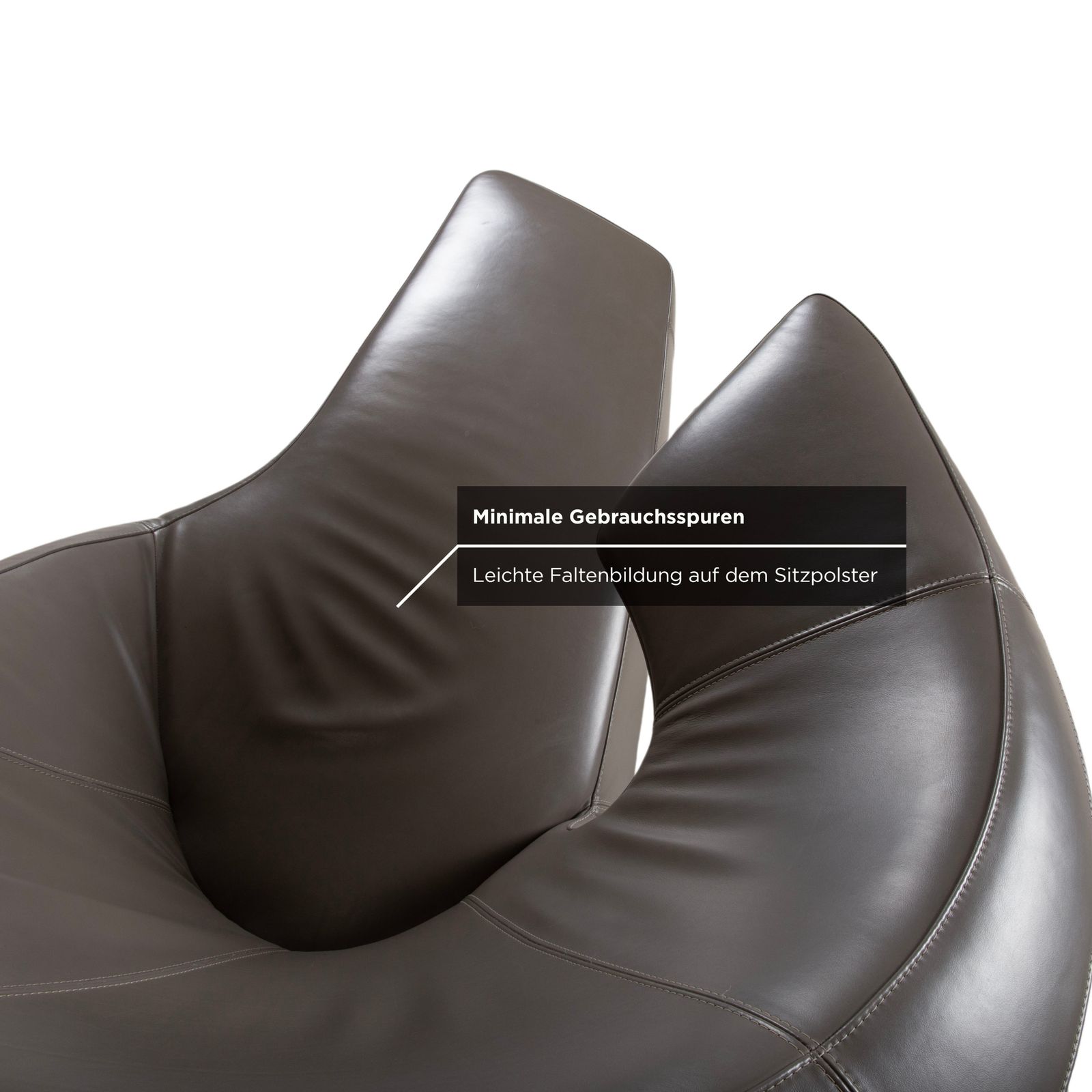 Fauteuil pivotant Leolux Parabolica en cuir gris photo vinterior