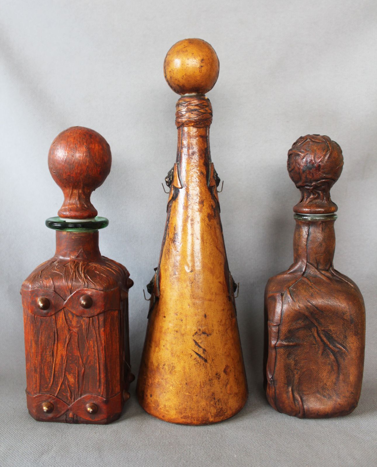 Set Of 3 Vintage Italian Leather Wrapped Glass Decanters, Italy Wrapped Bottle, Whisky Cognac, Lion Head, Hand Decorated, Hooks, Stopper photo vintage