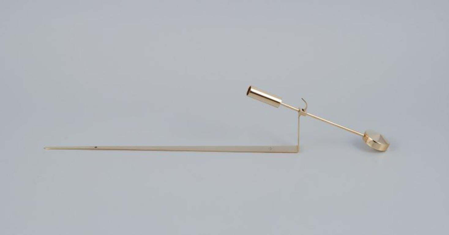 Pierre Forssell voor Skultuna. Een paar wandgemonteerde kandelaars in messing. photo for sale