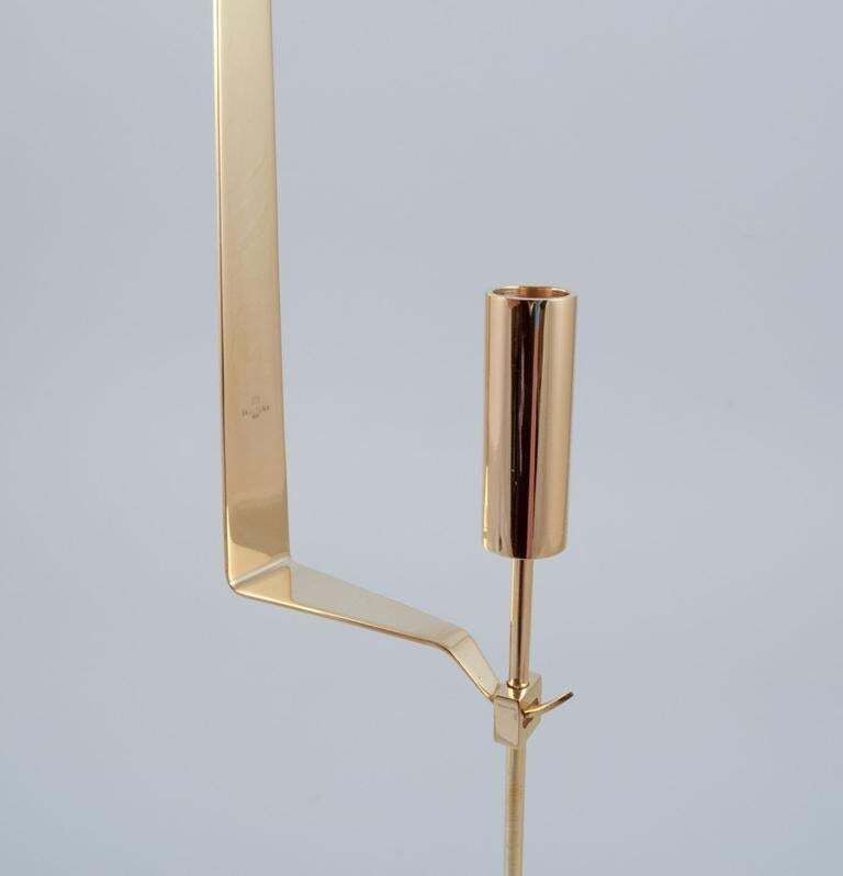 Pierre Forssell voor Skultuna. Een paar wandgemonteerde kandelaars in messing. photo Woonaccessoires