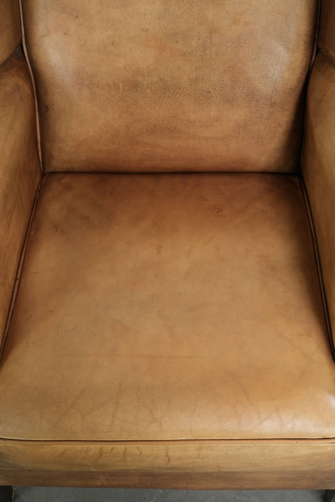 Beautiful Light Cowhide Wing Armchair With A Timeless English Look And Good Seating Comfort photo vinterior