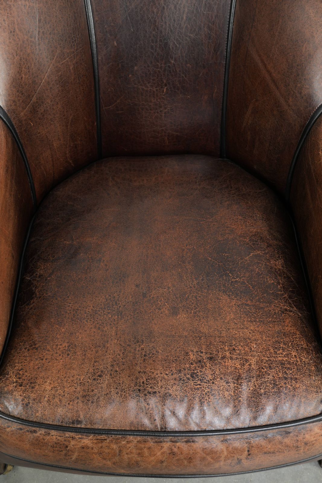 Characterful And Comfortable Vintage Sheepskin Armchair With A Unique Design And A Timeless Look photo vinterior