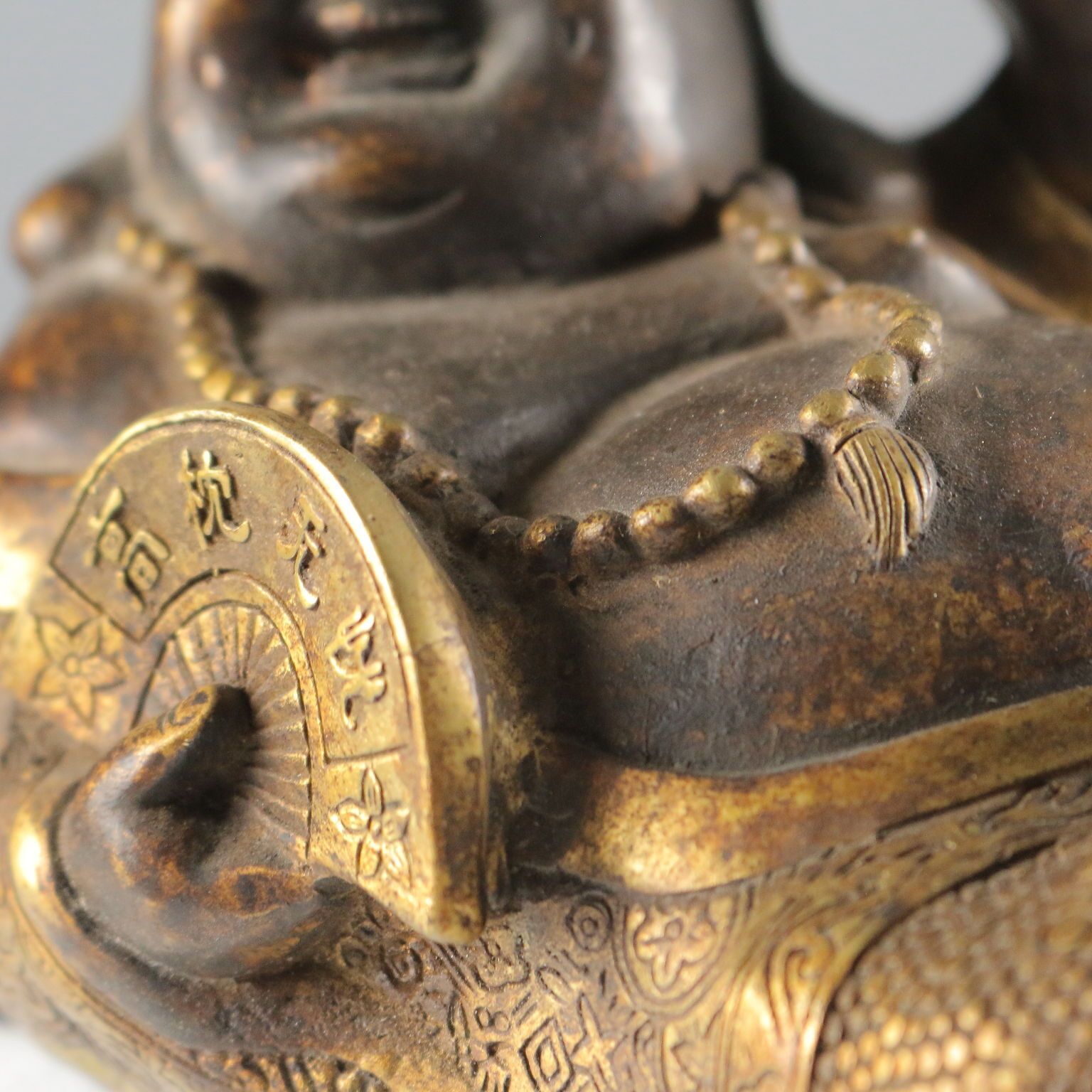 Budai bronzen sculptuur photo vintage