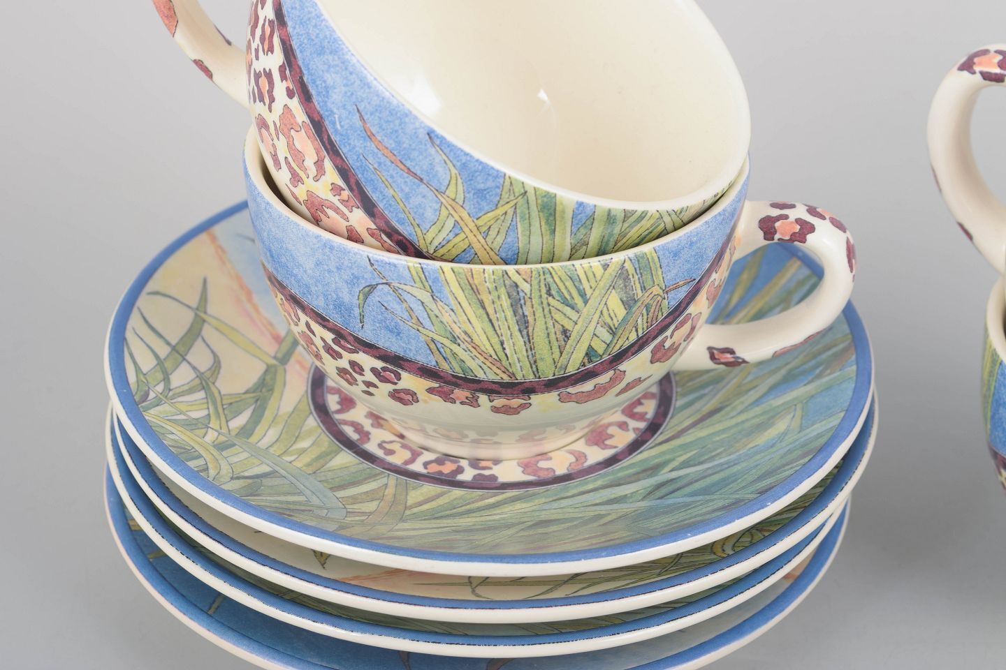 Gien, "Savane". Set van vier faience koffiekopjes met bijpassende schoteltjes. photo for sale