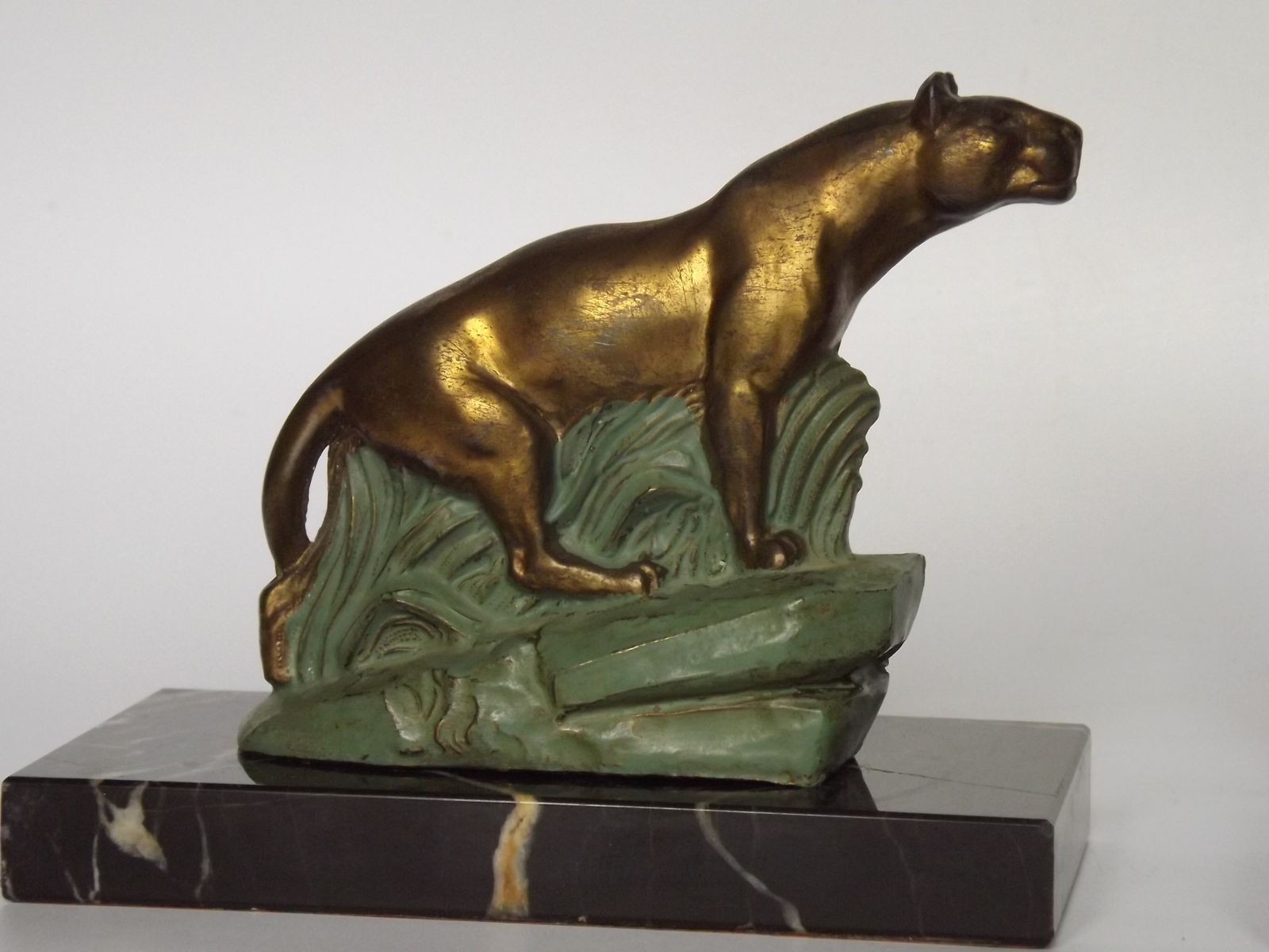 Franse art deco panter boekensteun - Marmeren en metalen boekensteun photo Woonaccessoires