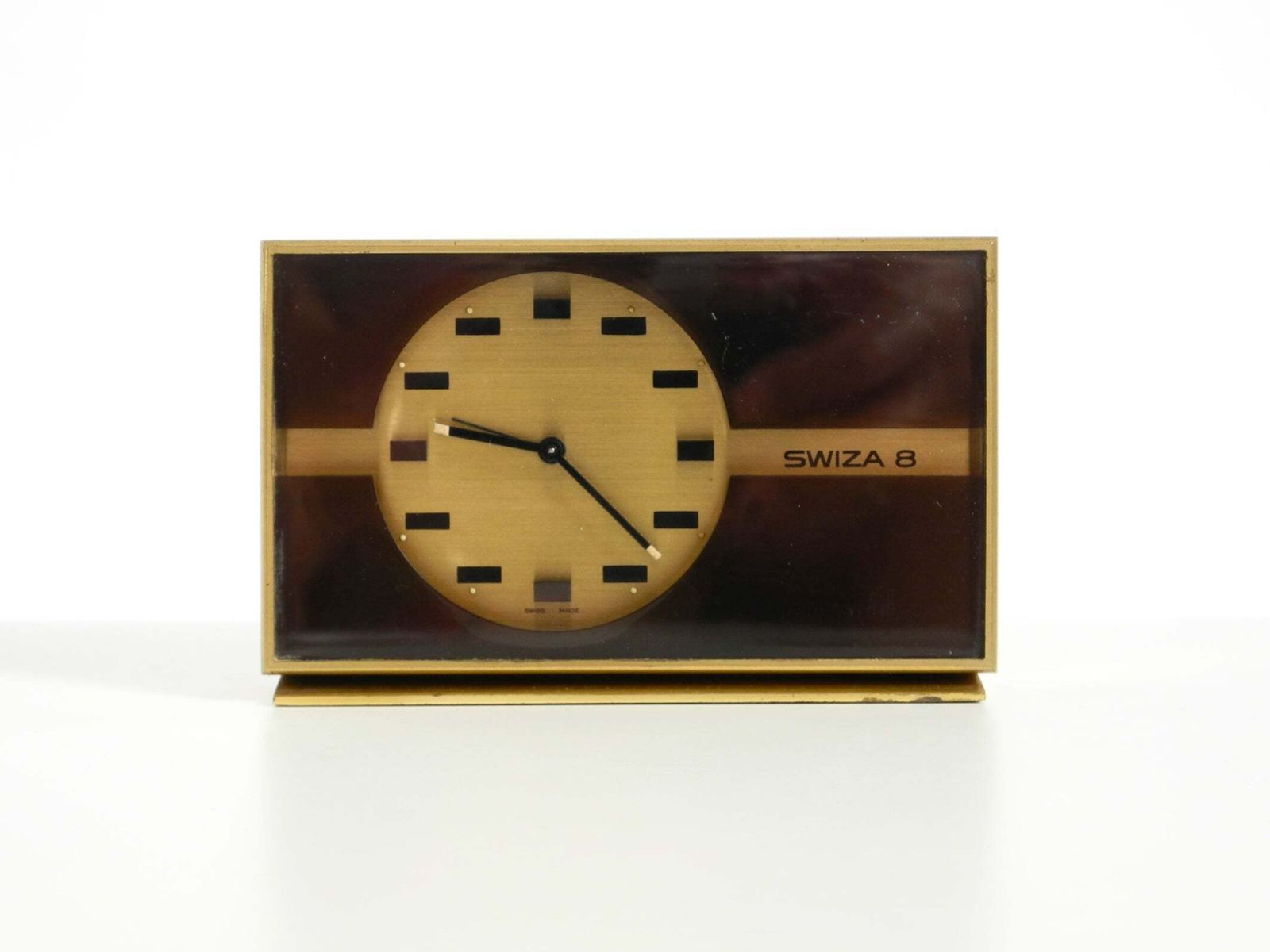 Swiss Made, klein en zeldzaam mechanisch tafelklokje SWIZA 8 in messing photo furniture