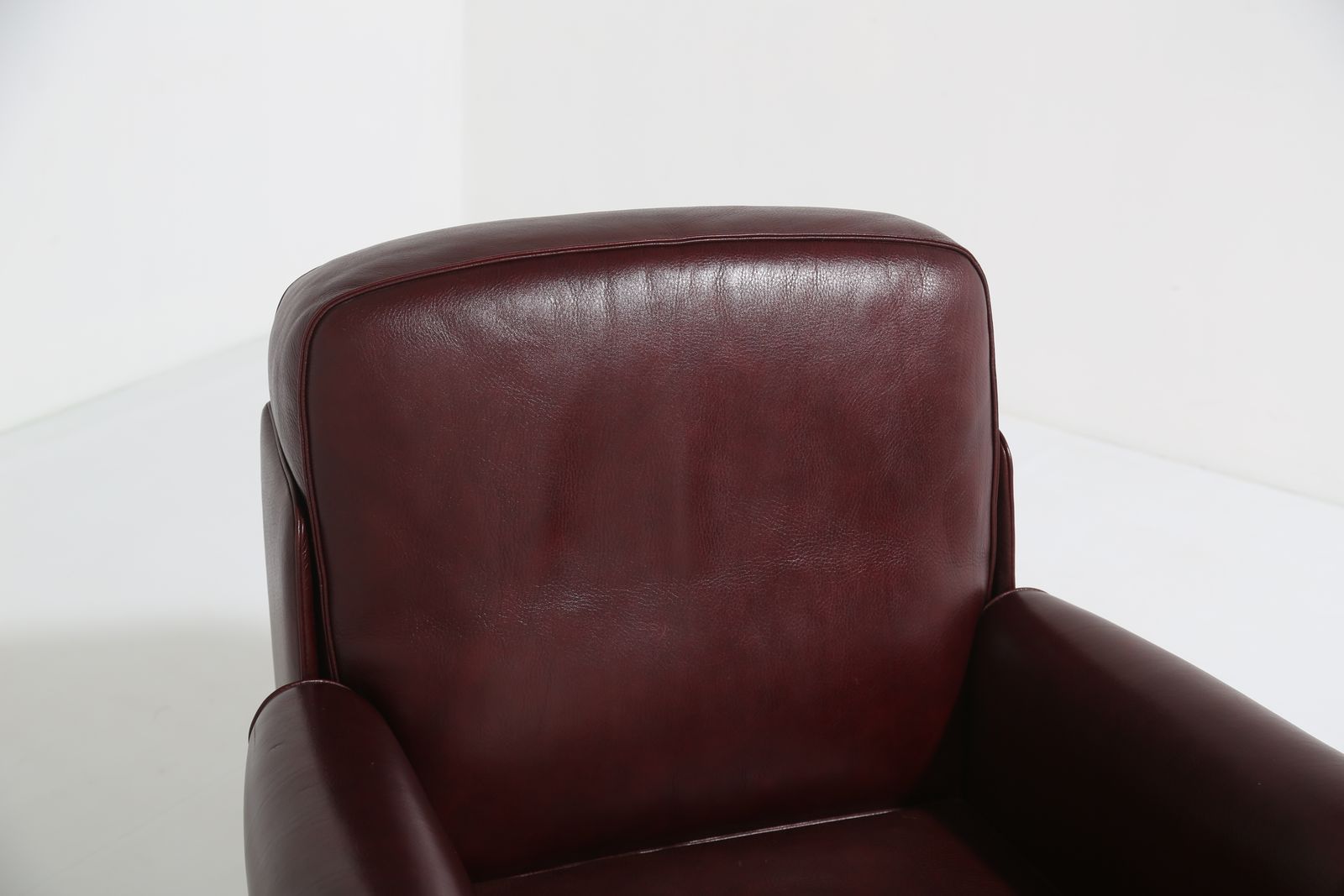 photo for sale Pair Of Art Deco Style Italian Burgundy Leather Club Chairs By Fratelli Mascheroni