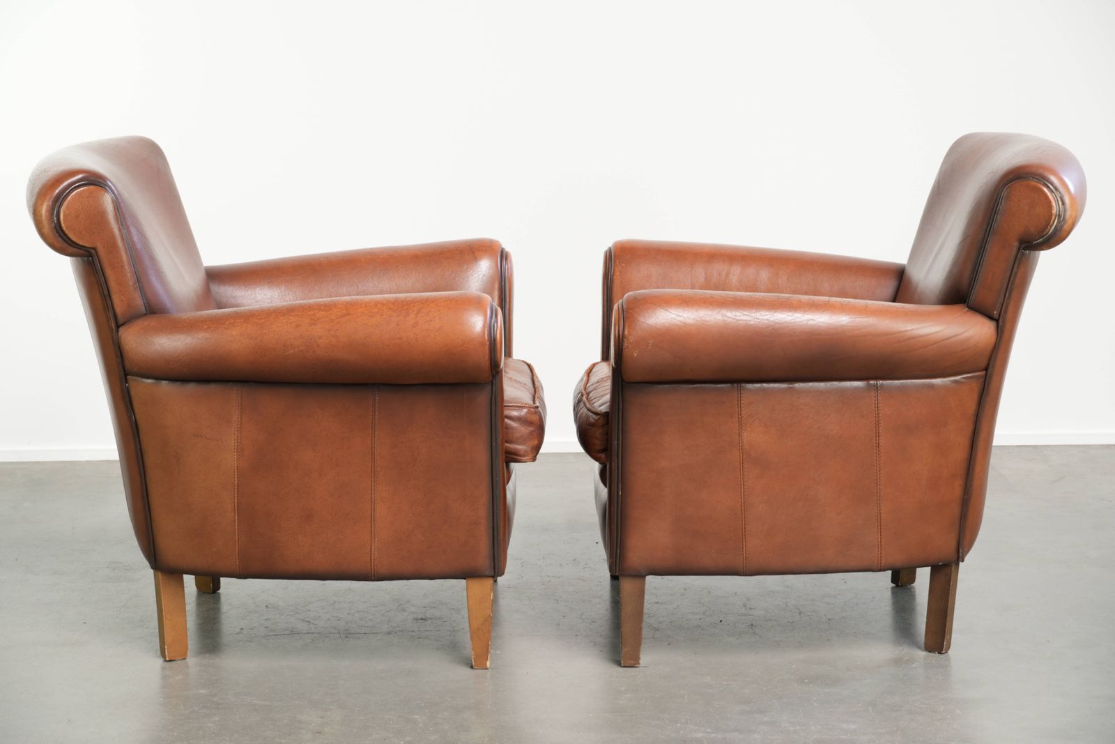 Nice Set Of 2 Comfortable Sheepskin Armchairs With A Timeless Look And Good Seating Comfort. photo furniture