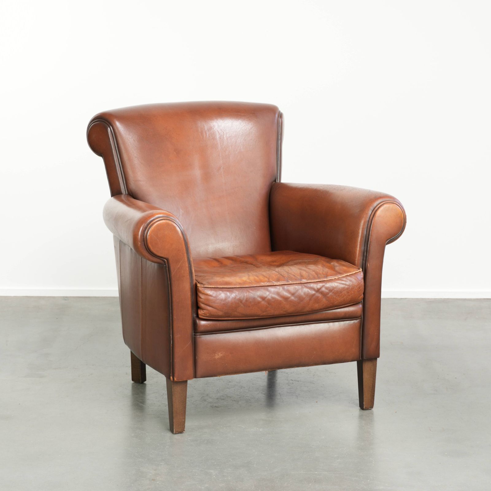 Comfortabele schapenvacht fauteuil met mooie kleuren en strakke afwerking
