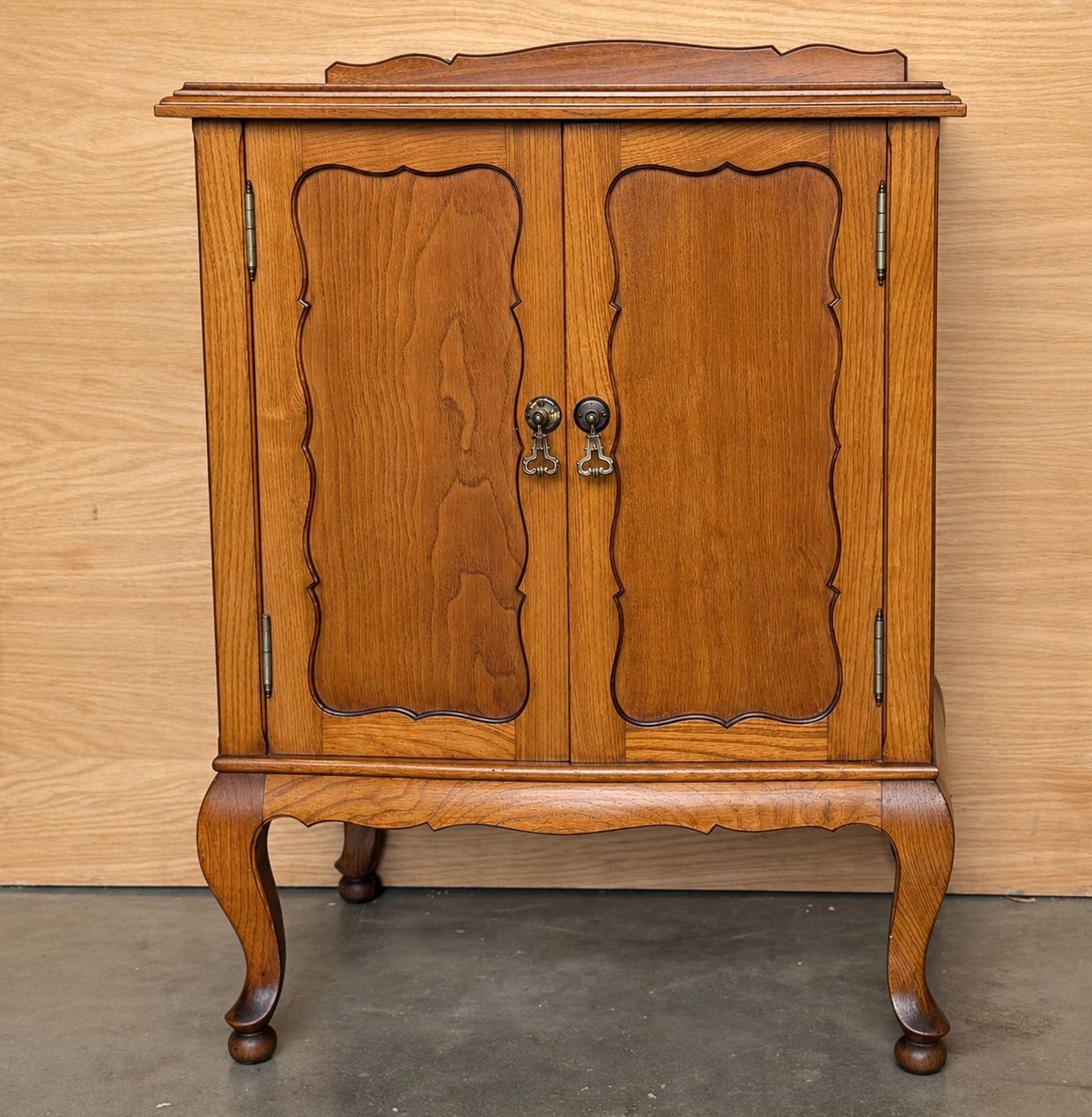 Early 20th English Oak Two Door Cabinet With Cabriole Legs & Decorative Paneling photo for sale