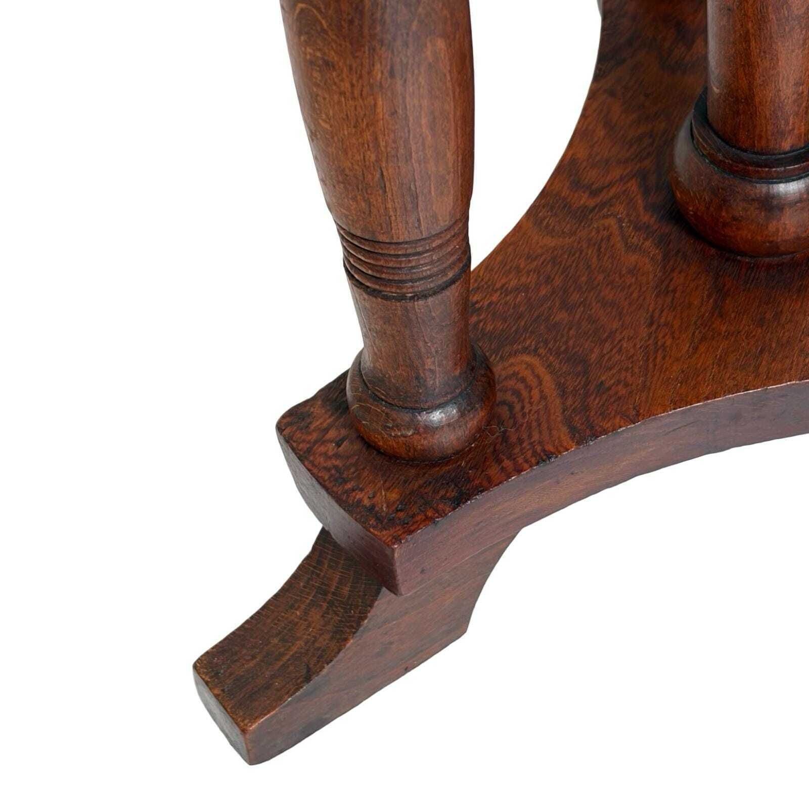 Antieke houten pianokruk, stoel op draaivoet, leren zitting photo for sale